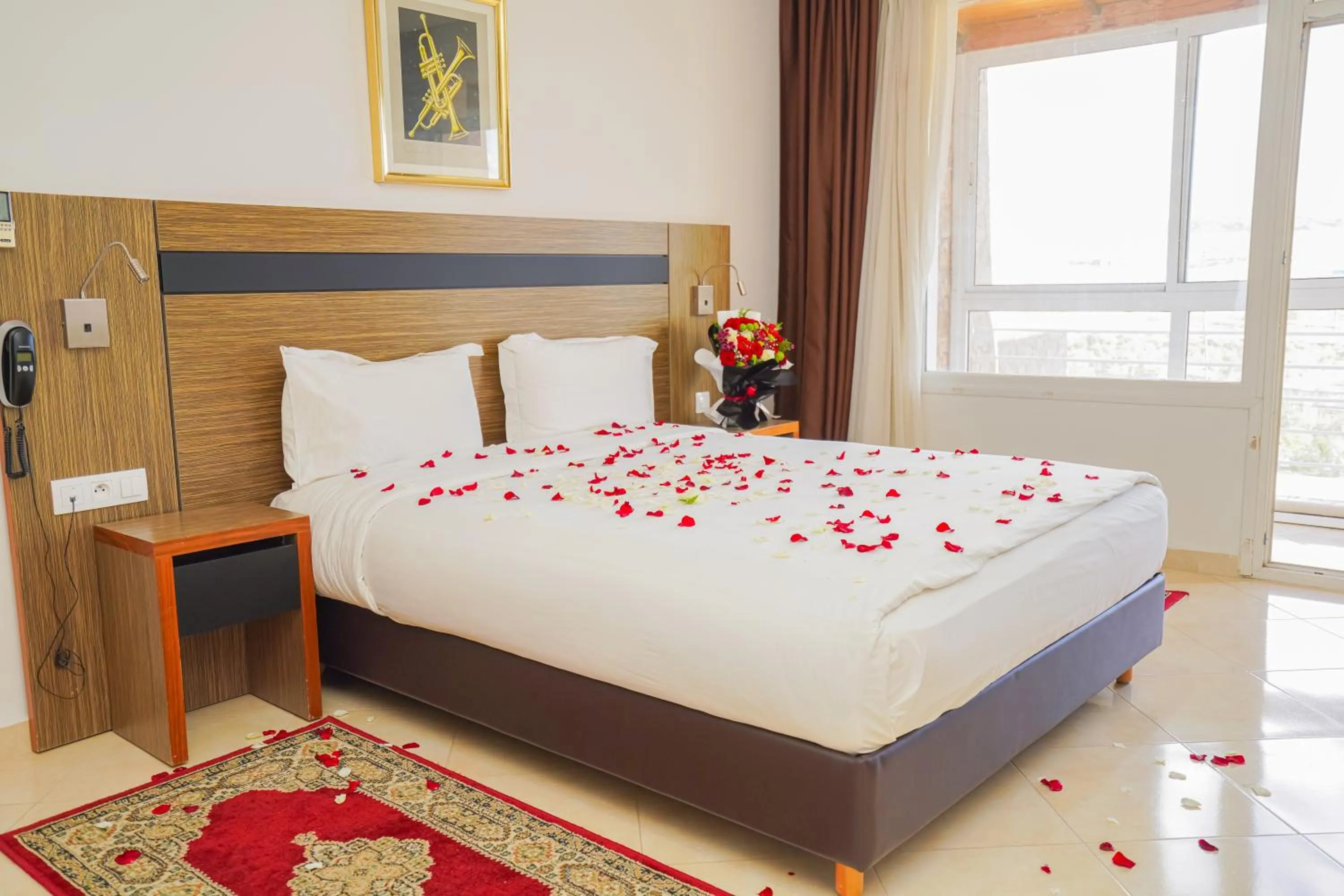 Bed in Tanger Med Hotel, Conference & Catering