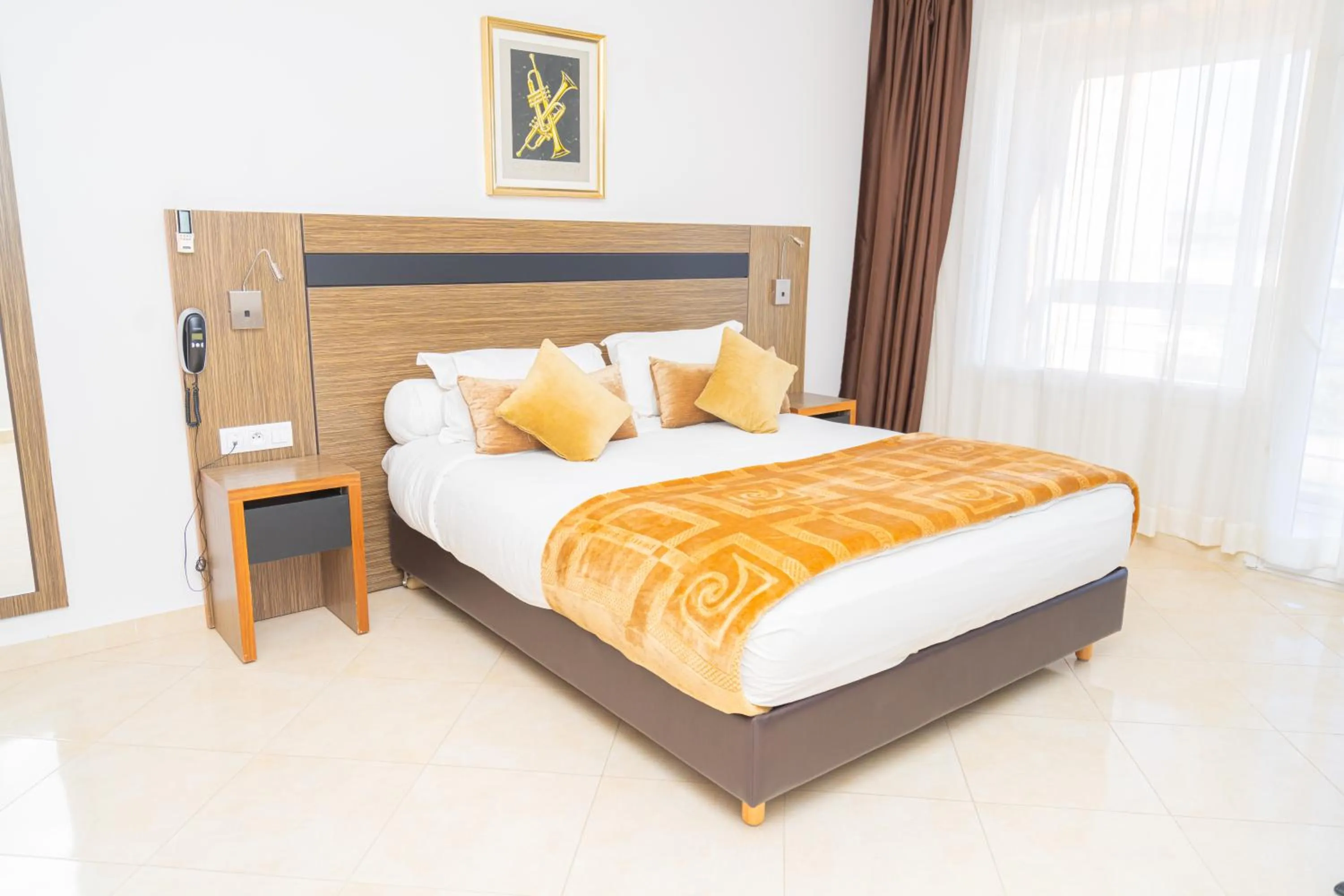 Bed in Tanger Med Hotel, Conference & Catering