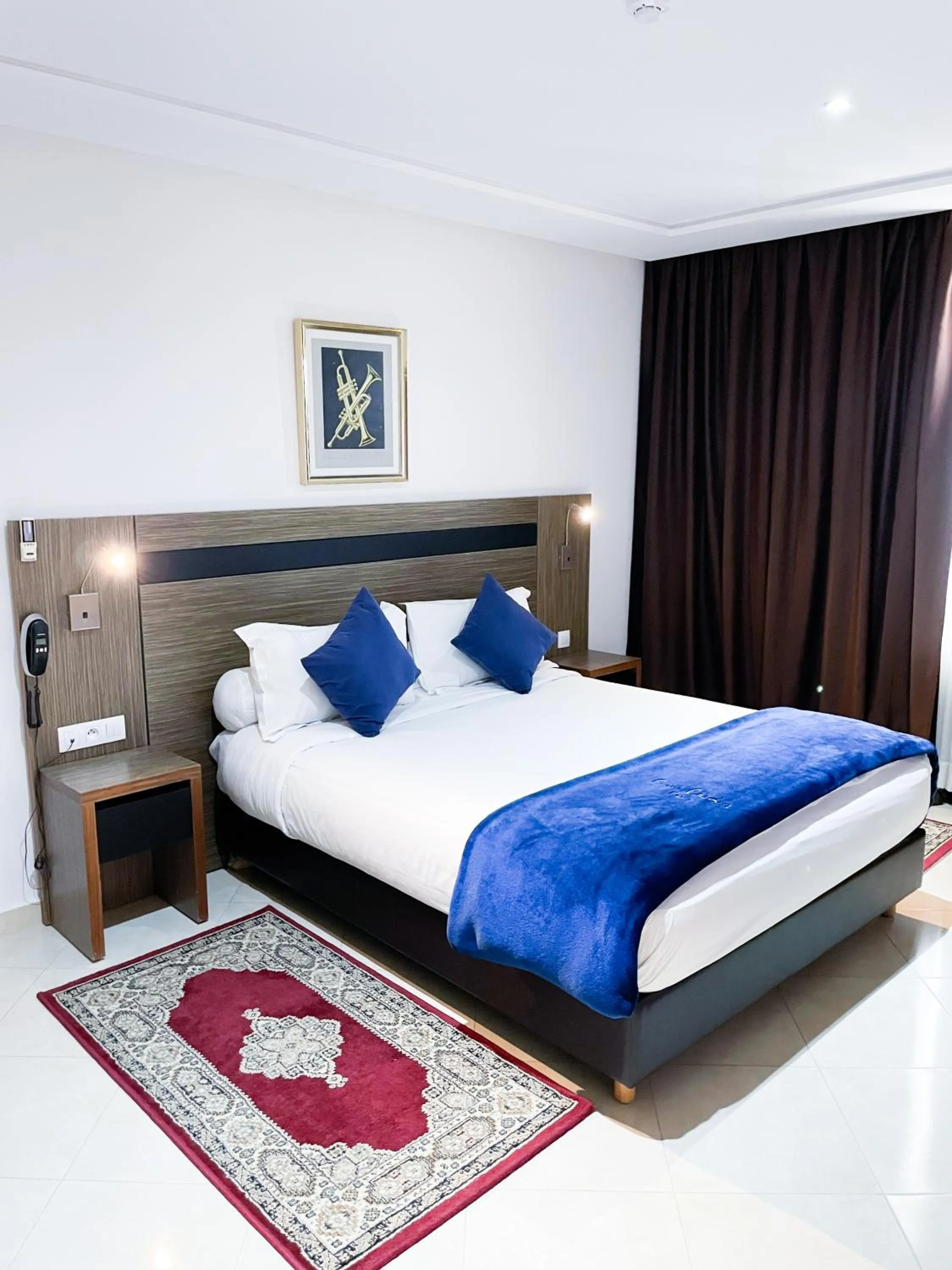 Bed in Tanger Med Hotel, Conference & Catering