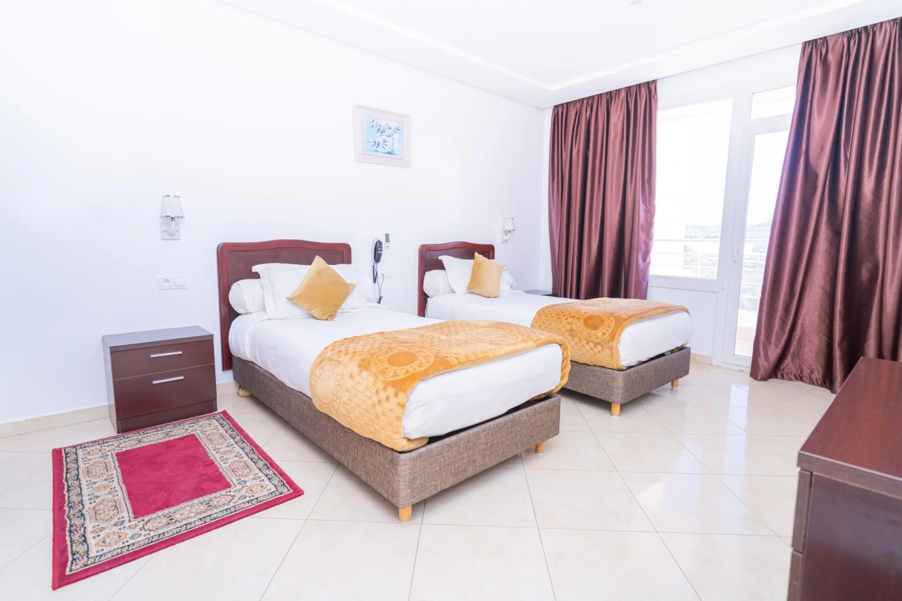 Bed in Tanger Med Hotel, Conference & Catering