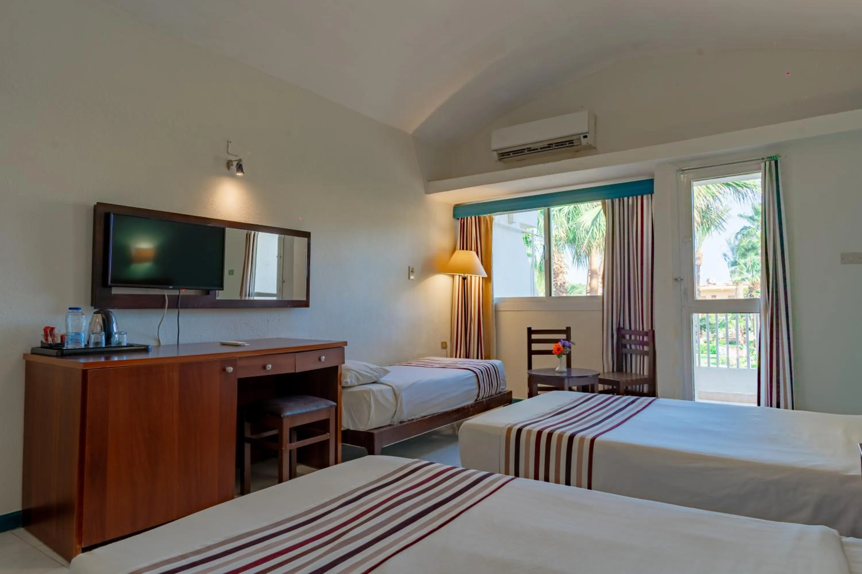 Bedroom, Bed in Empire Beach Aqua Park