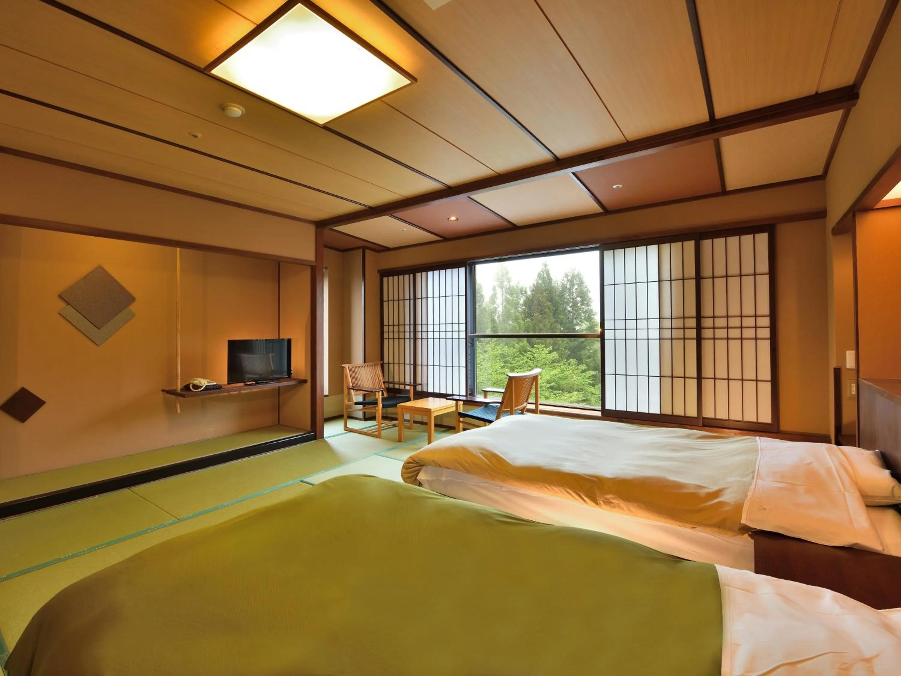Photo of the whole room, Bed in Yunogo Onsen HOTEL YUNOMORI BISYUNKAKU