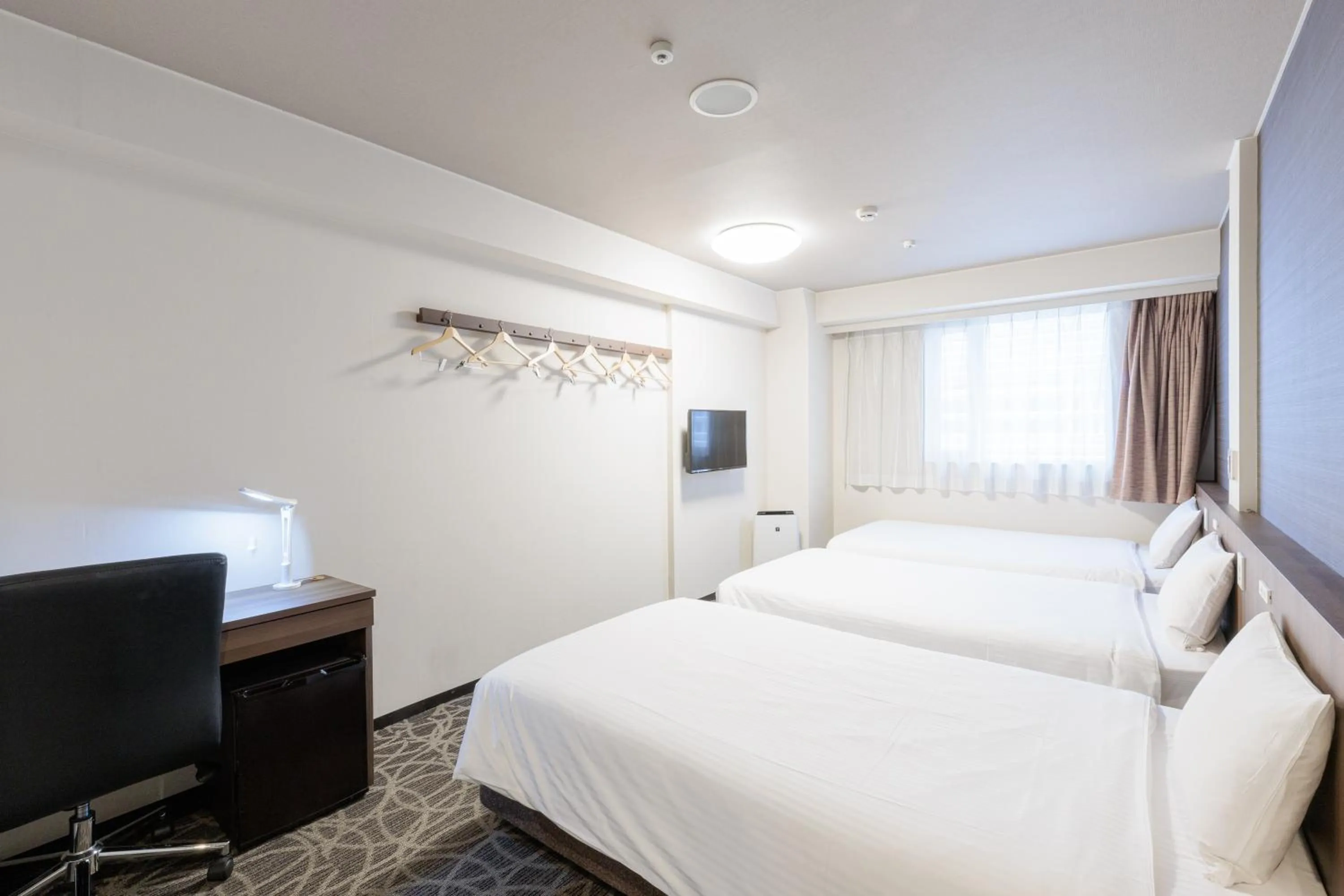 Photo of the whole room, Bed in Hotel Silk Tree Nagoya