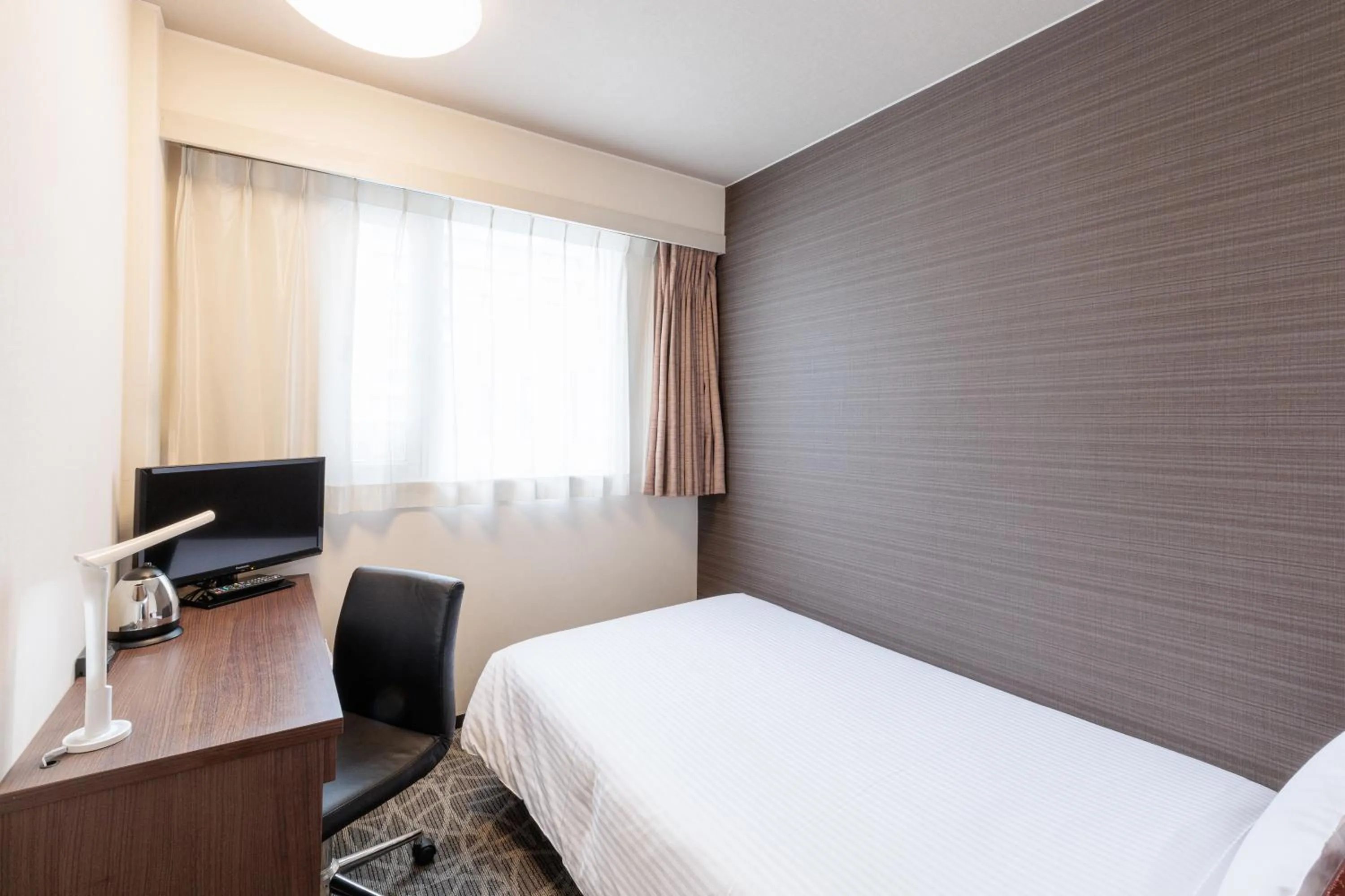 Photo of the whole room, Bed in Hotel Silk Tree Nagoya