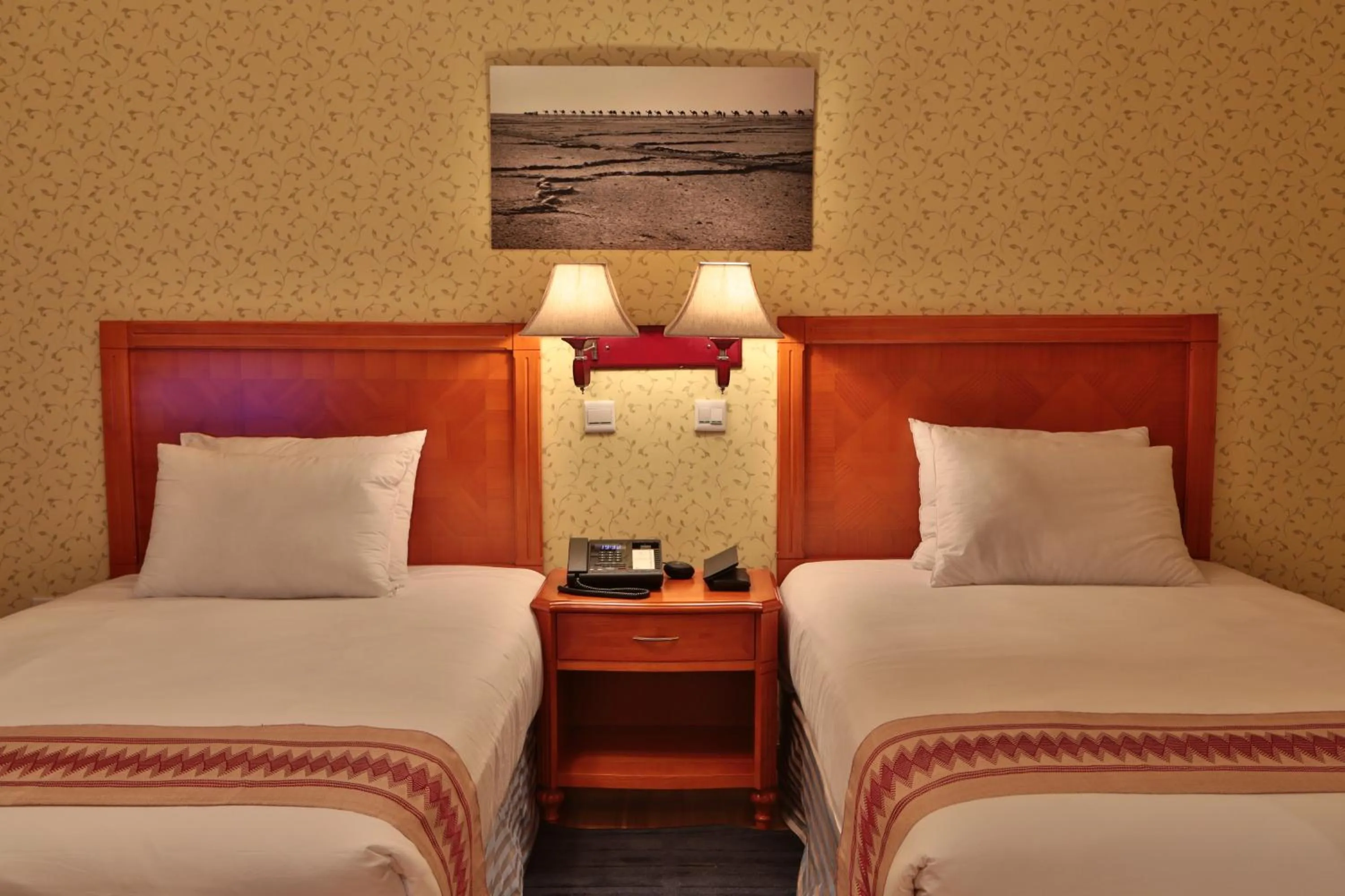 Bed in Abyssinia Renaissance Hotel