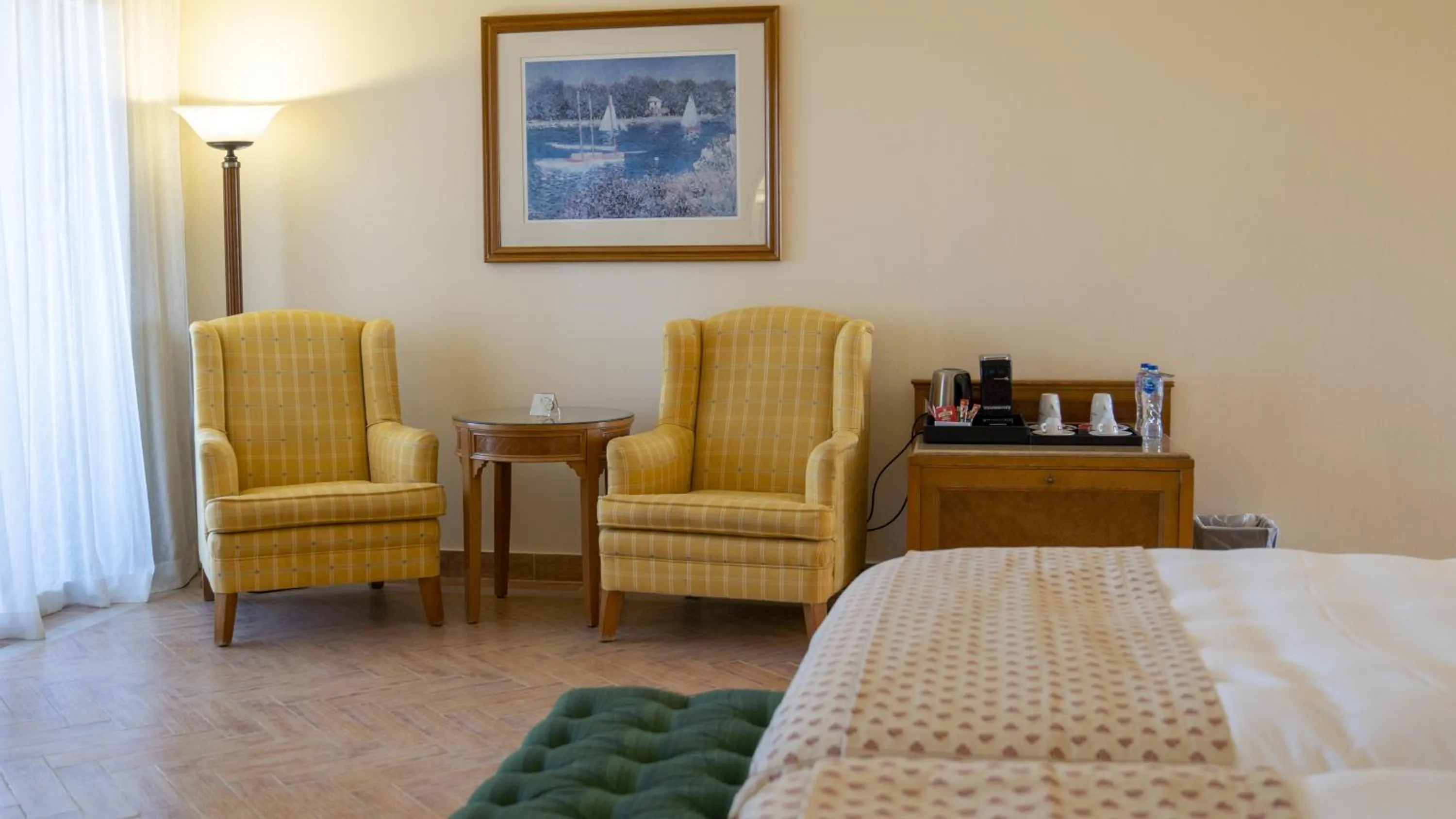 Seating area, Bed in The Cascades Golf Resort, Spa & Thalasso