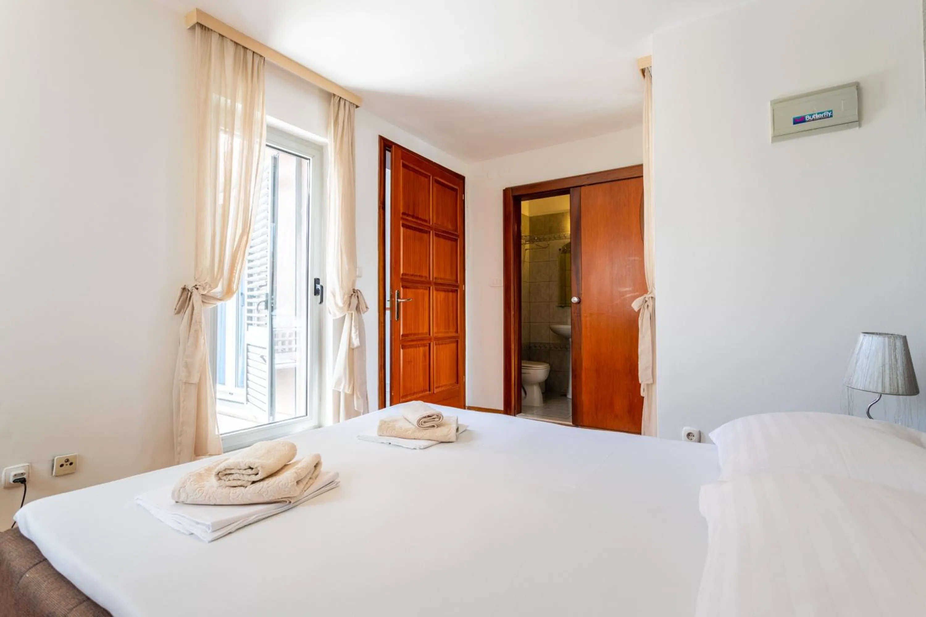 Bed in Villa Violeta with the sea view, 3 min walk to the beach