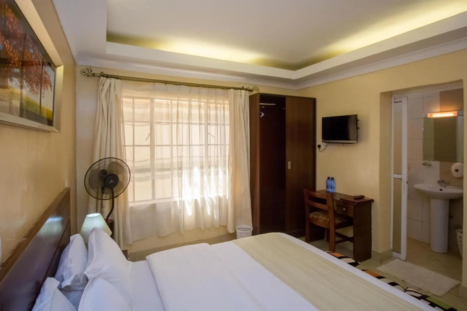 TV and multimedia, Bed in Capital Heights Hotel
