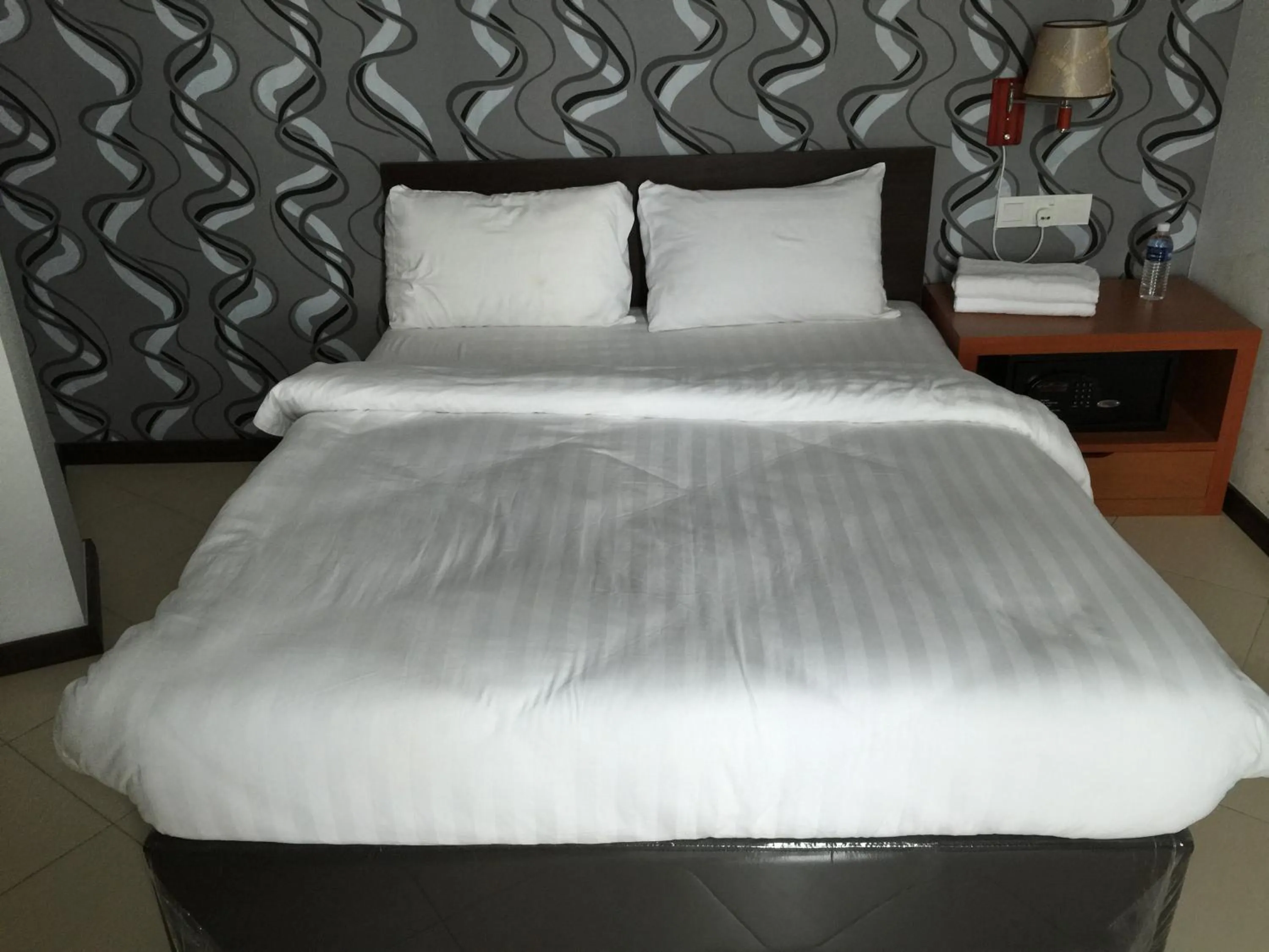 Bed in Permai Hotel