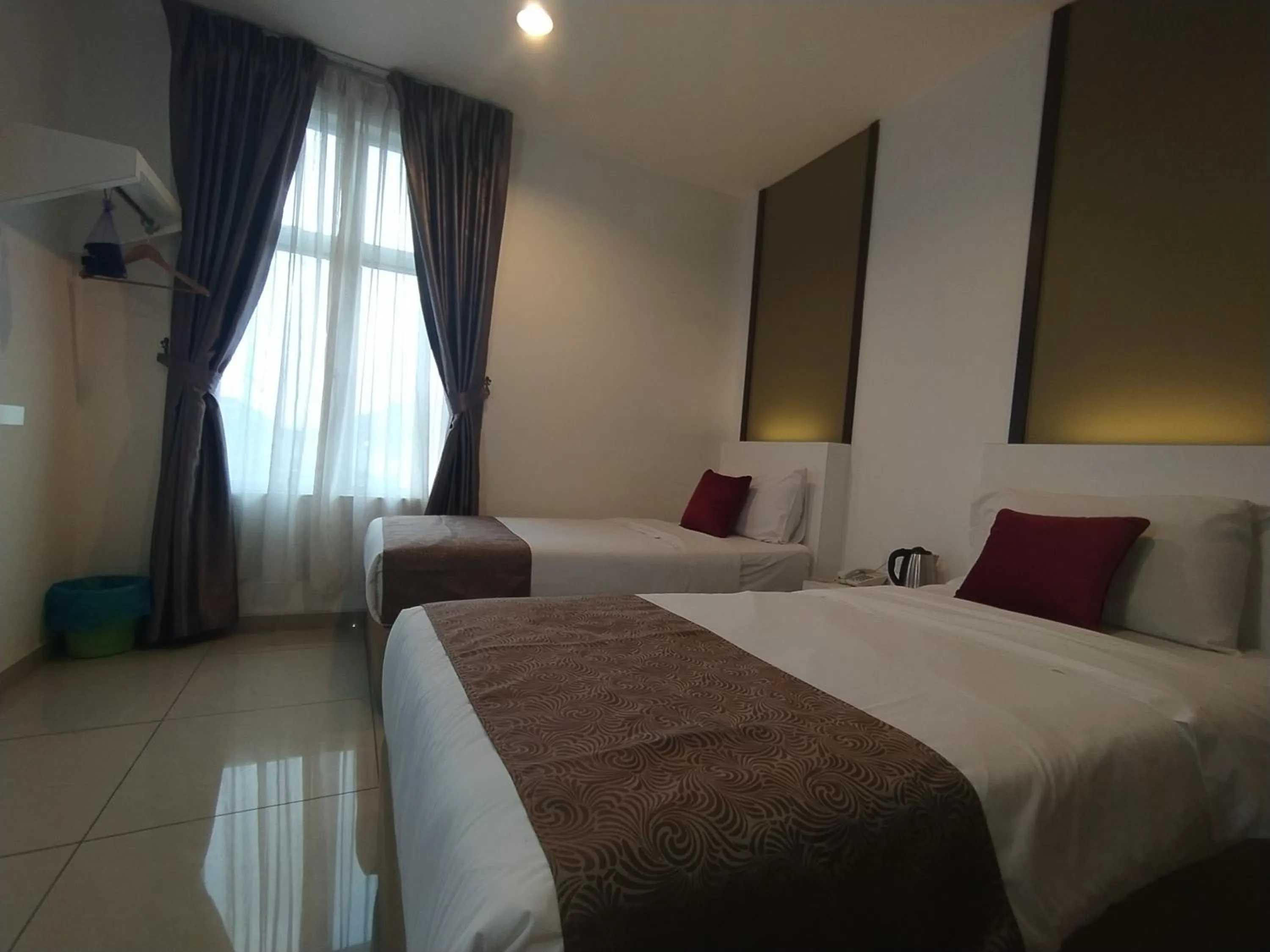 Bedroom in Crescendo Boutique Hotel