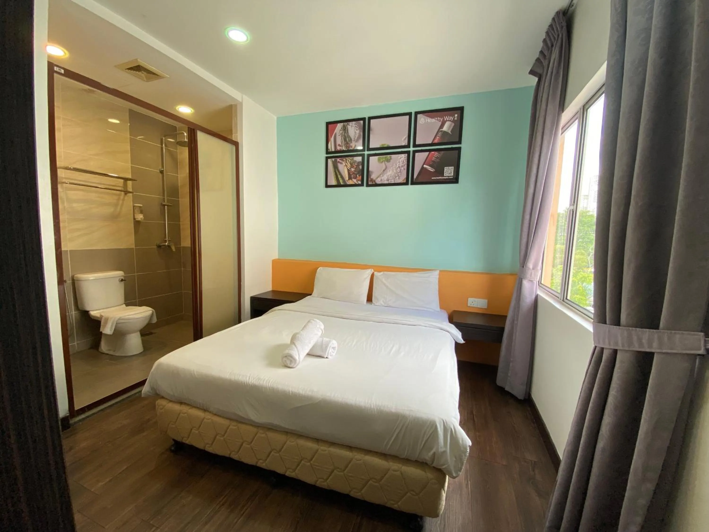 Bedroom, Bed in Timez Business Hotel