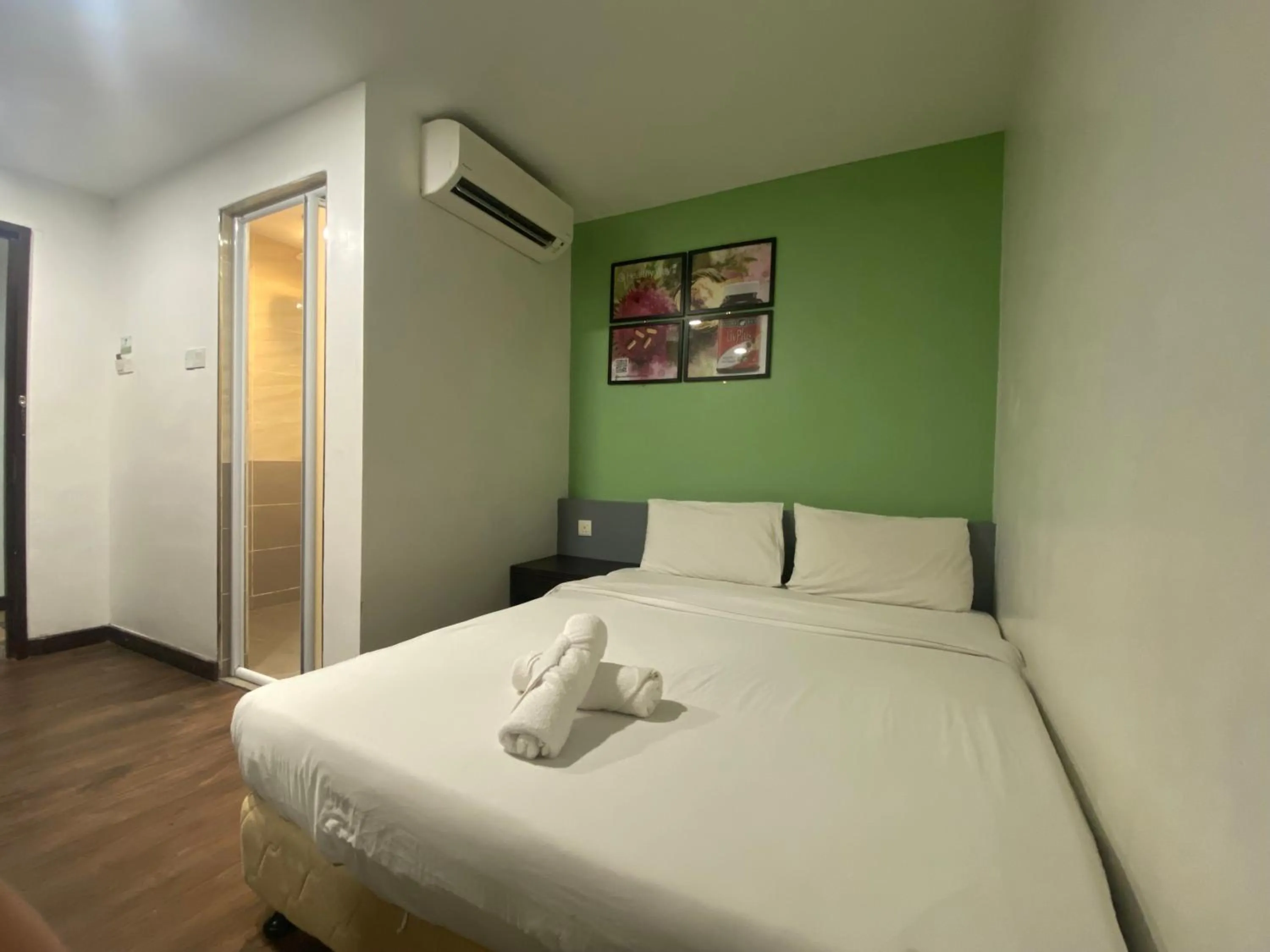 Bedroom, Bed in Timez Business Hotel