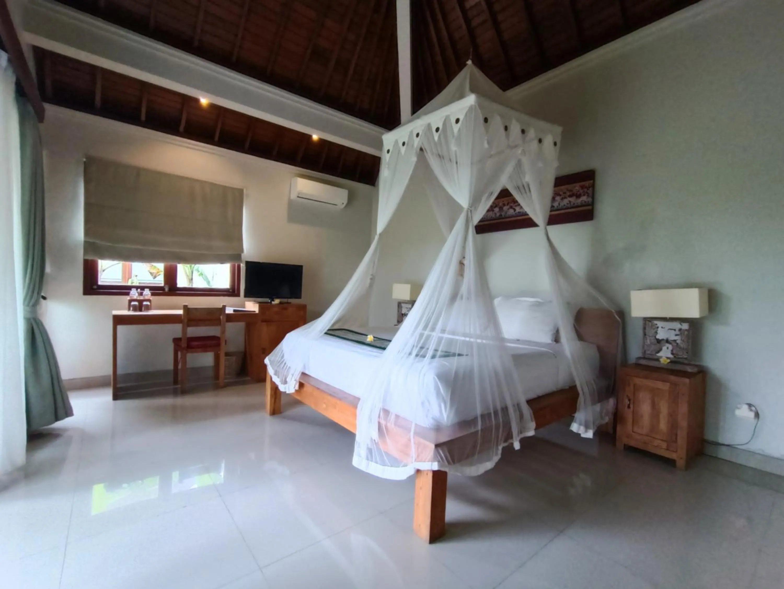 Bed in Masia Villa Ubud
