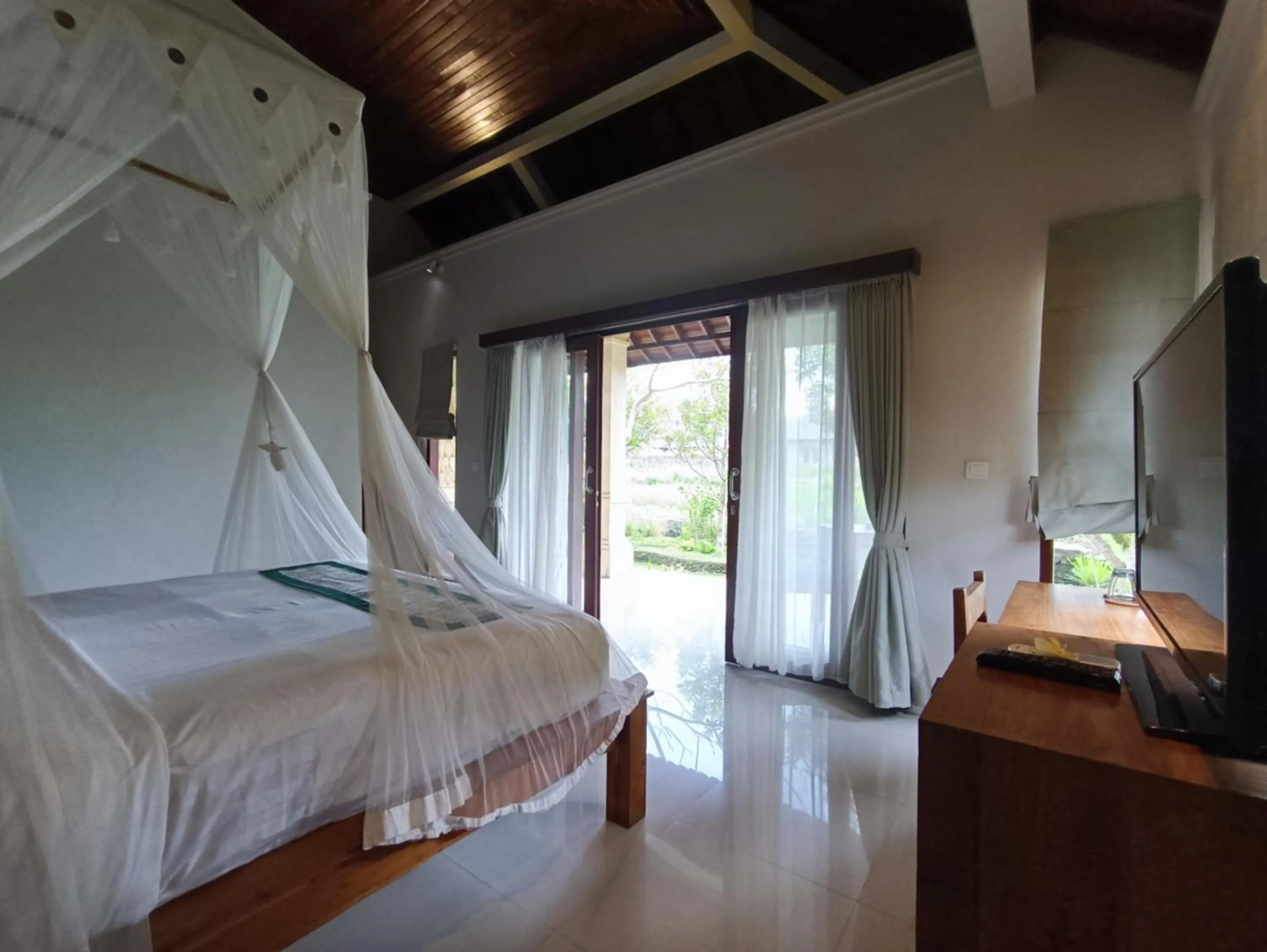 Bed in Masia Villa Ubud