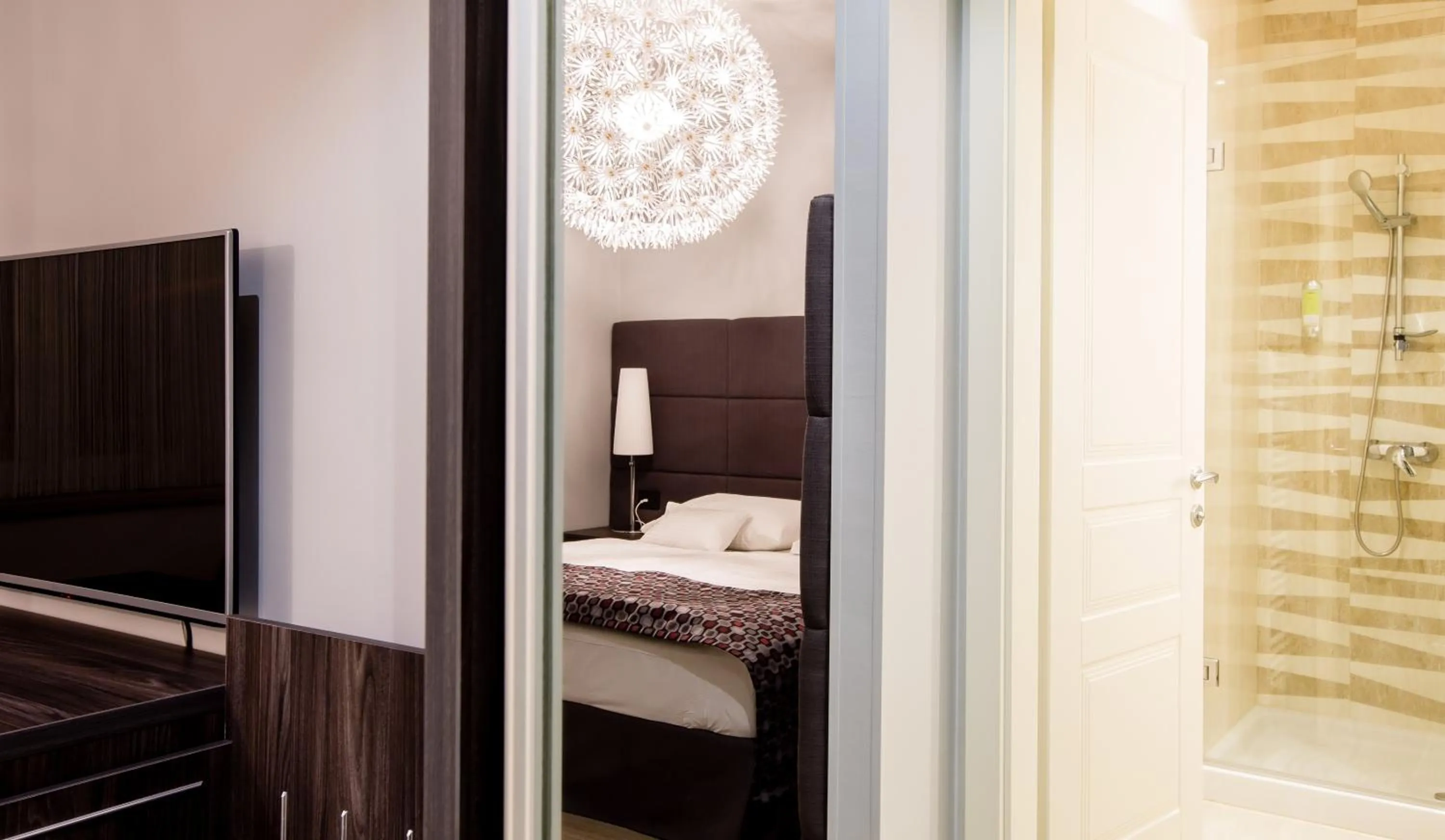 Photo of the whole room, Bed in WH Apartments