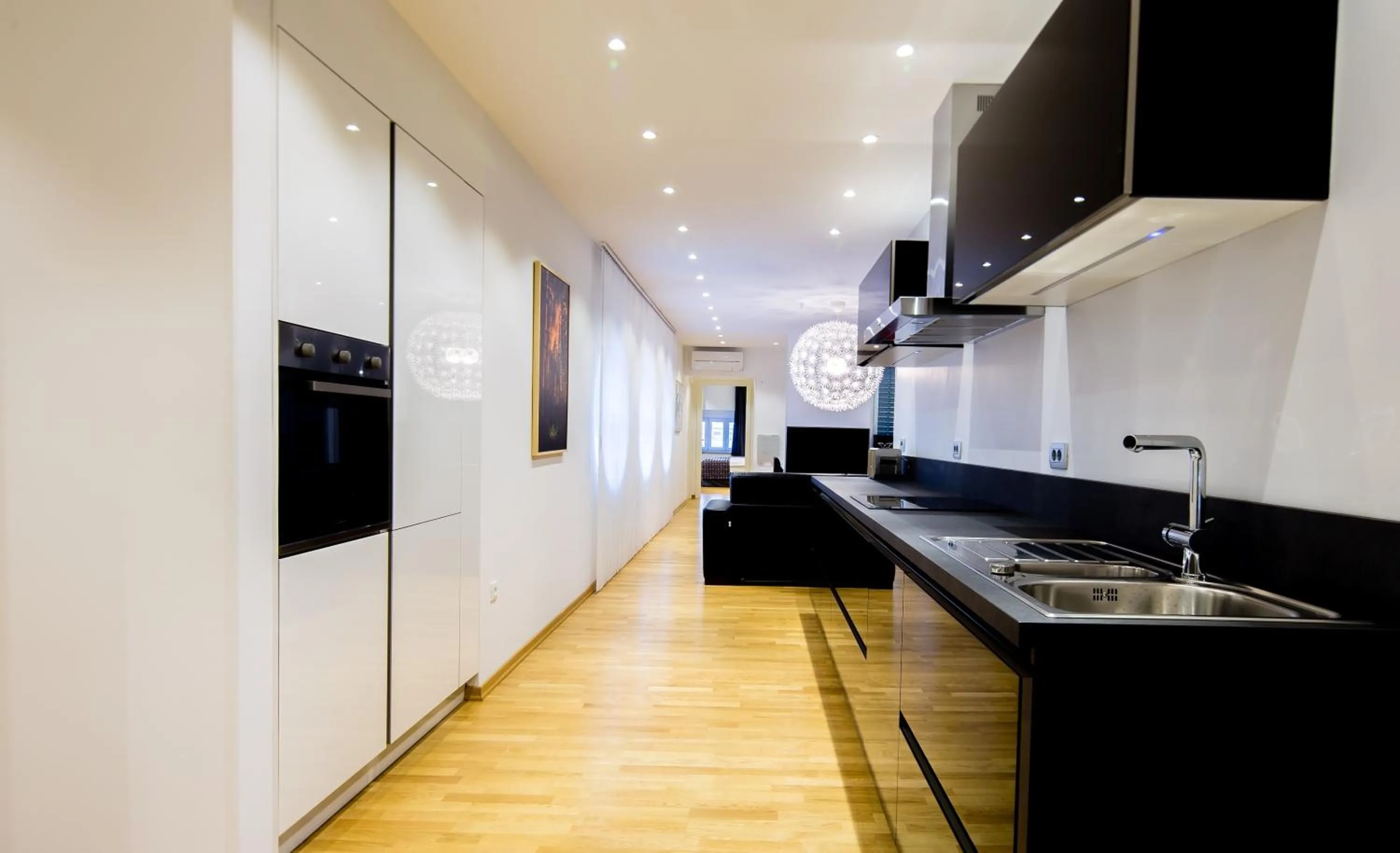 Kitchen or kitchenette in WH Apartments