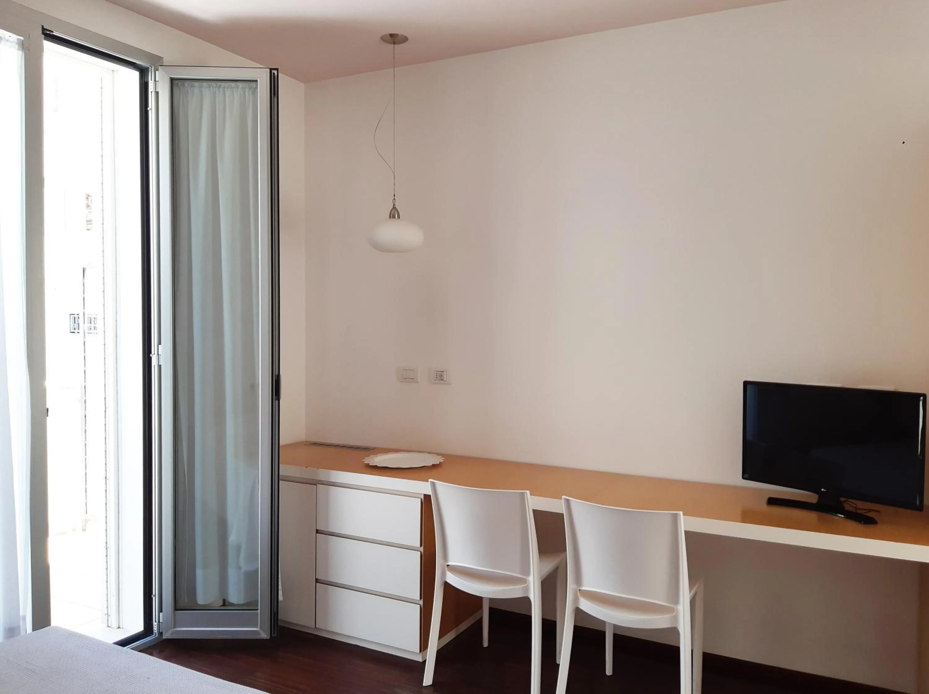 Bedroom in Hotel Grecale