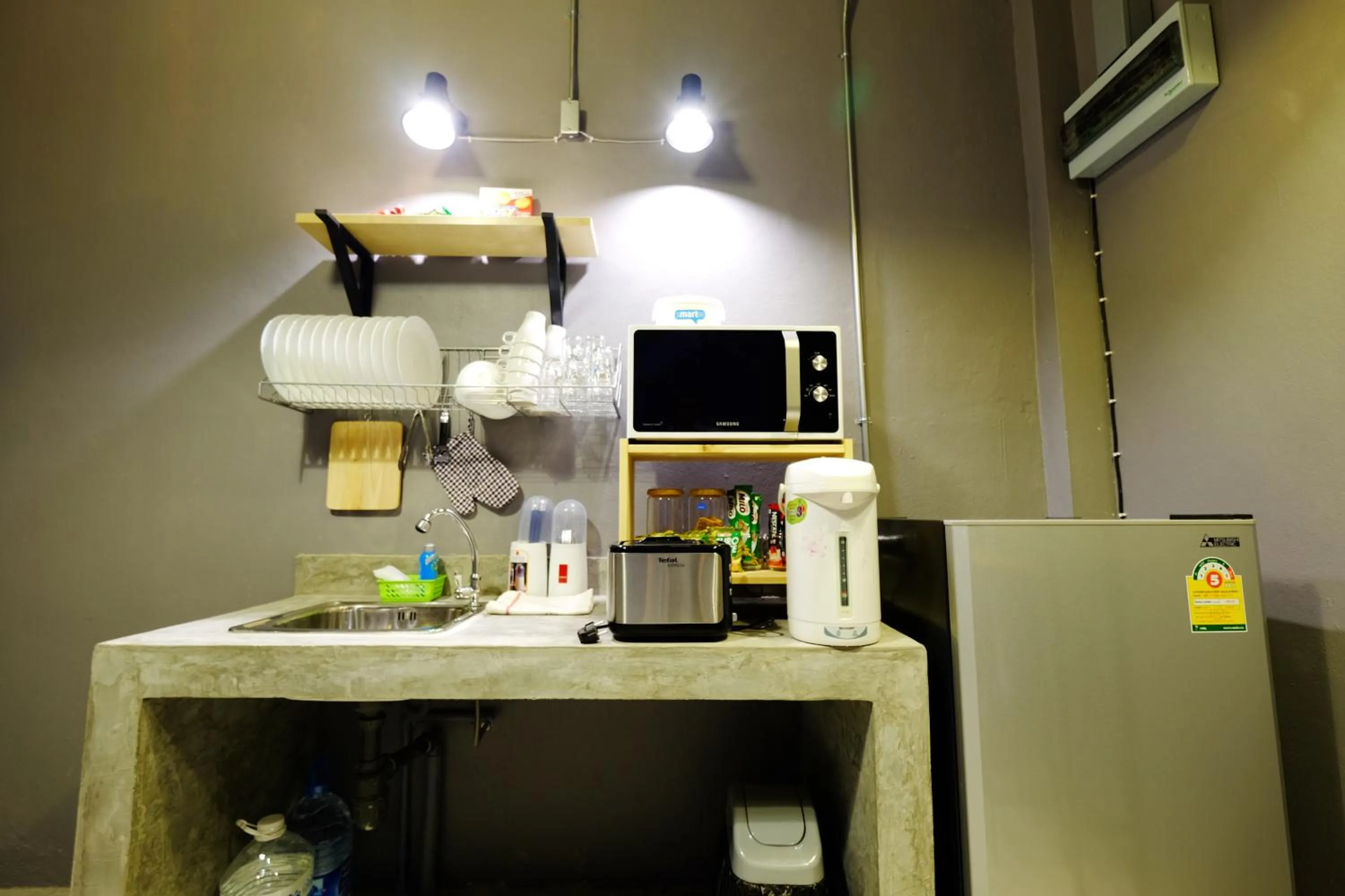 Communal kitchen in The Backpack Hostel