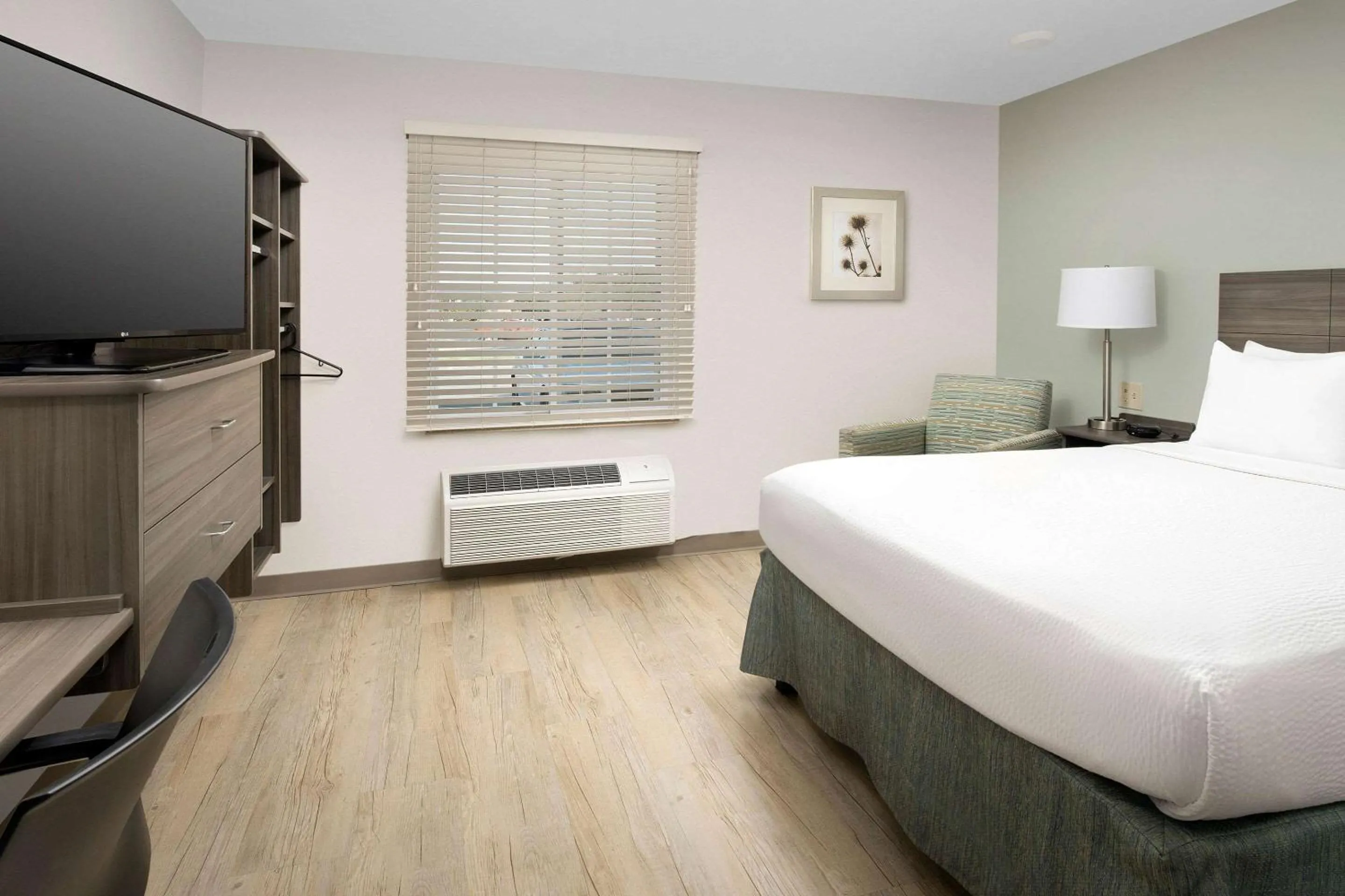 Bedroom, Bed in WoodSpring Suites Broken Arrow