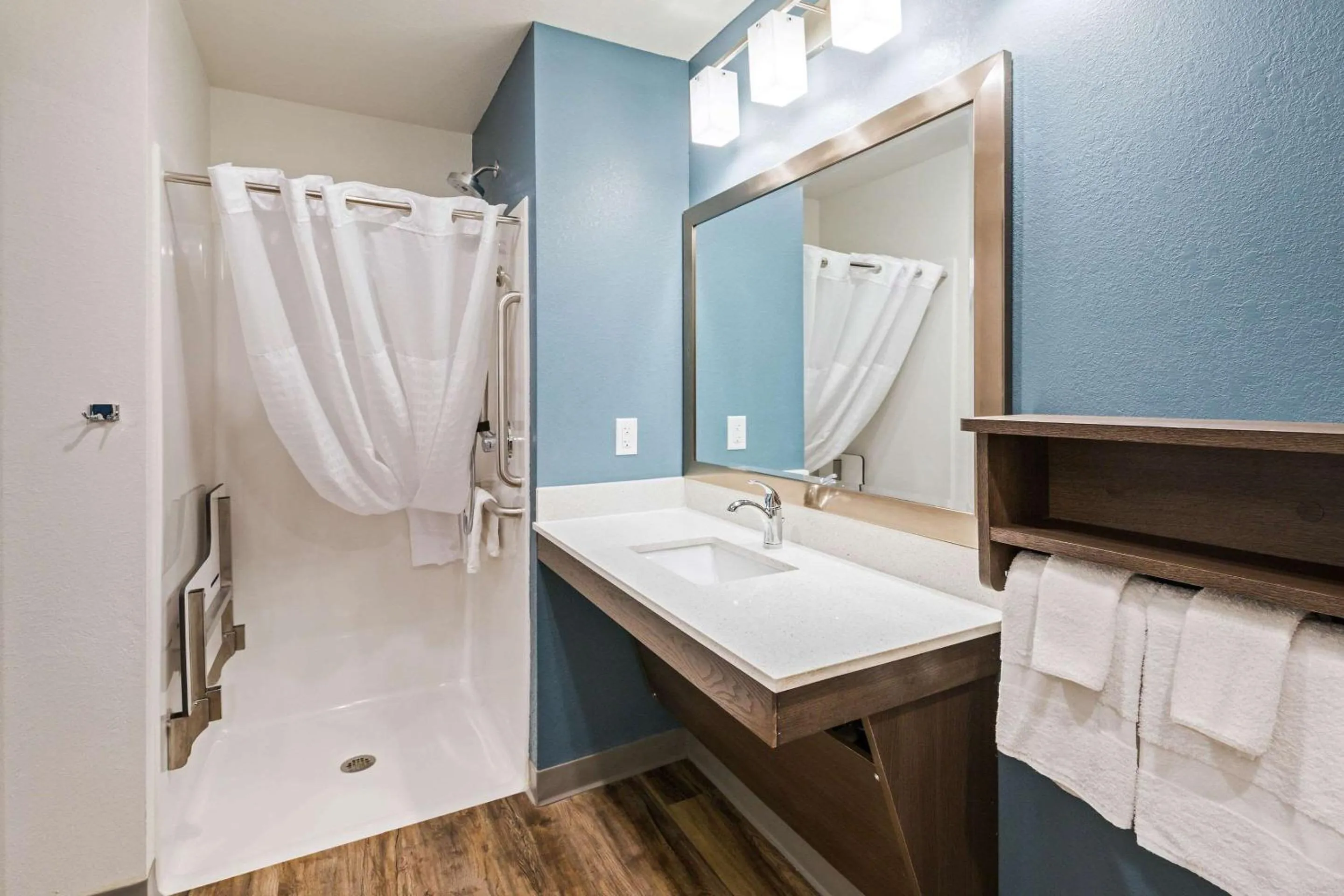 Bathroom, Bed in WoodSpring Suites Broken Arrow