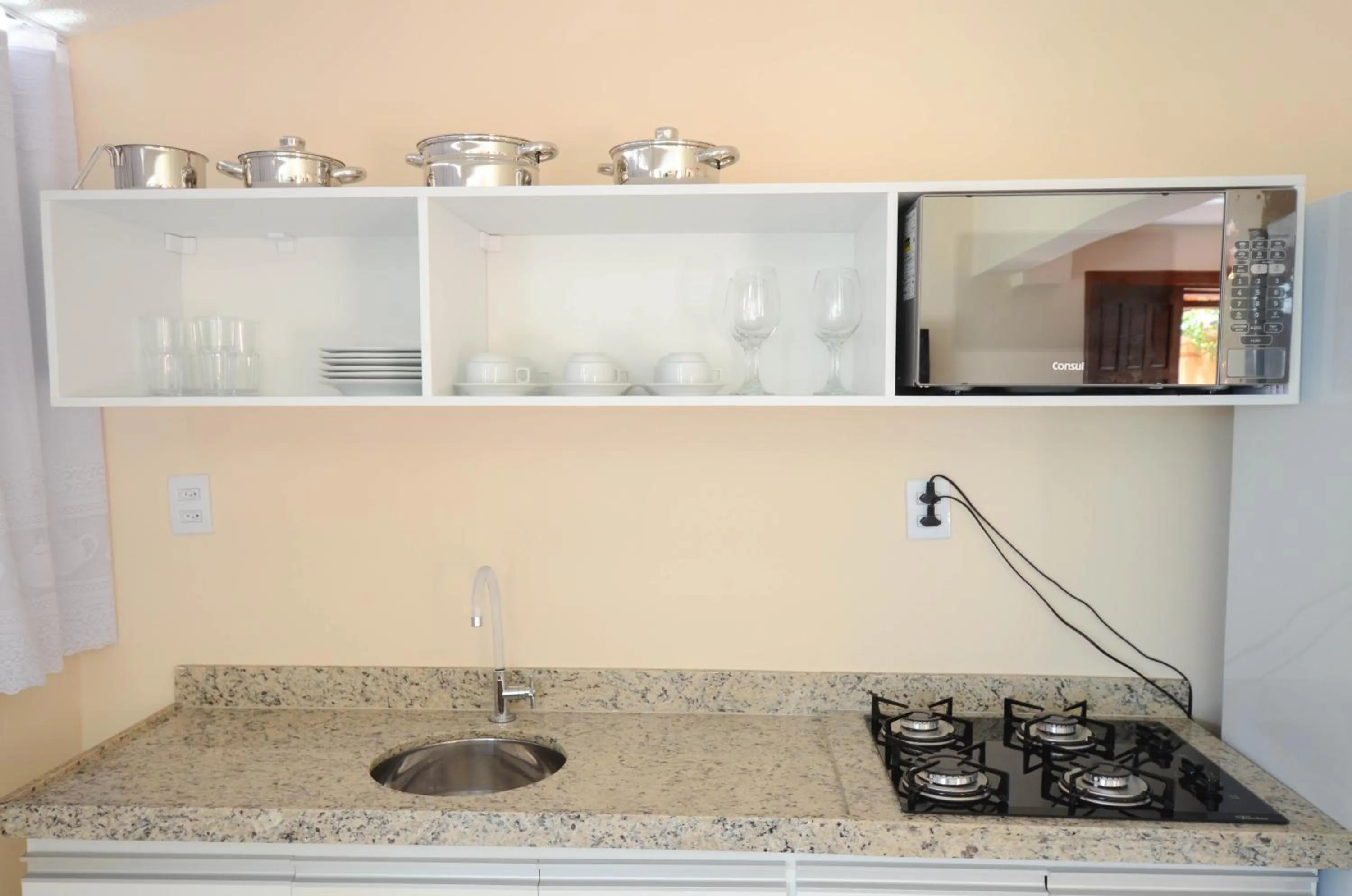 Kitchen or kitchenette in Flat Vila 4 Amigos