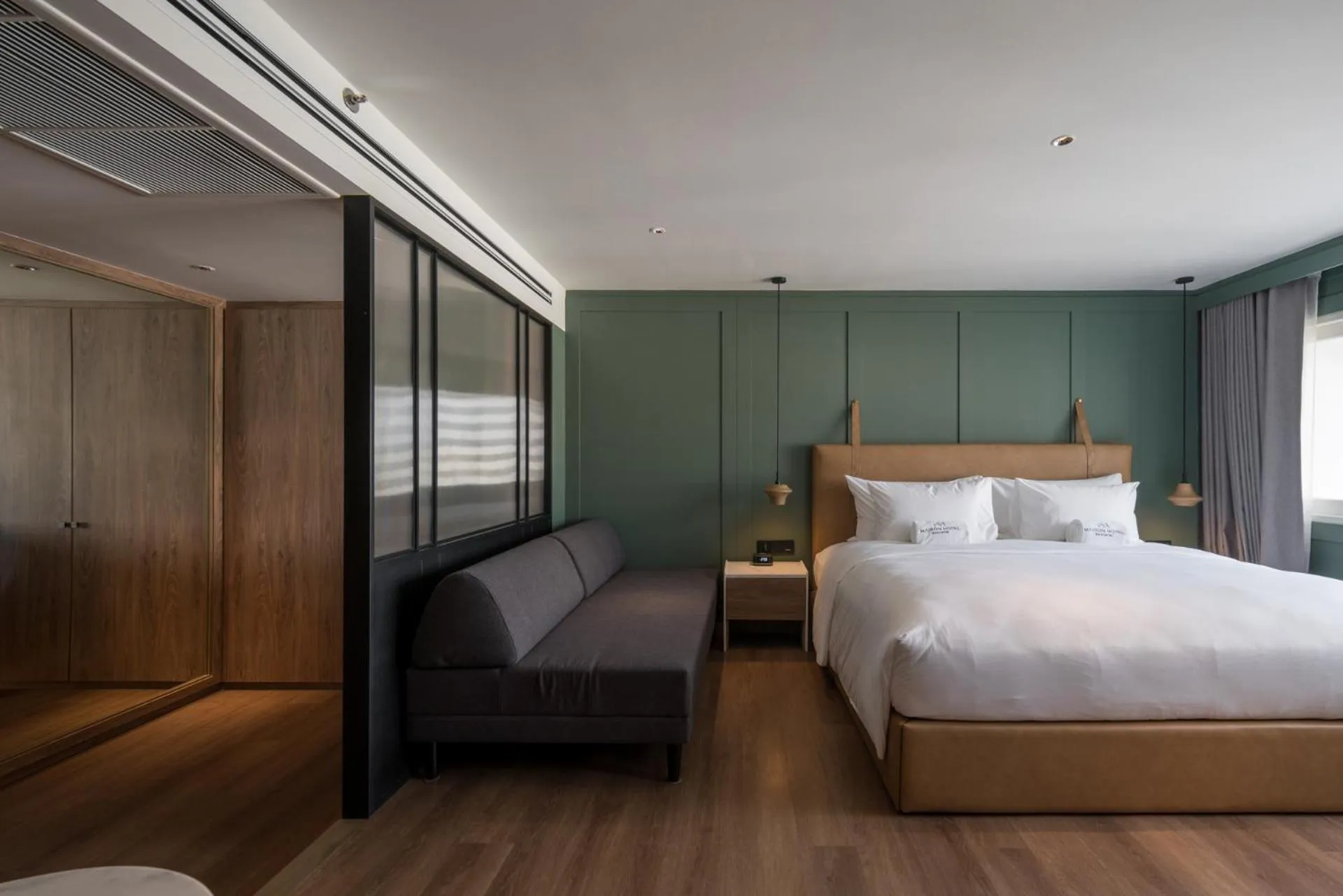 Seating area, Bed in Rajah Hotel