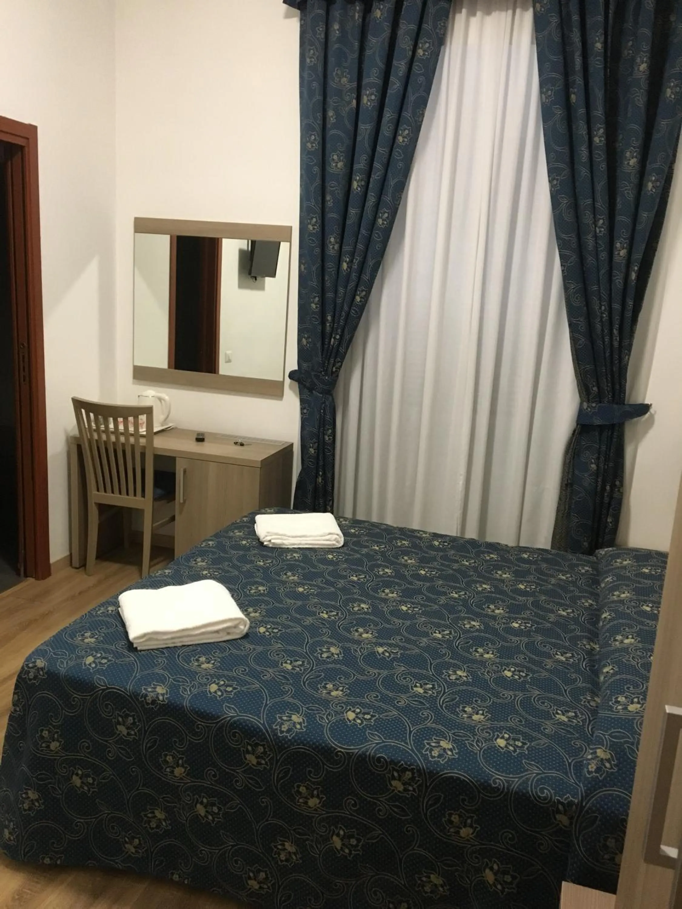 Photo of the whole room, Bed in Marziah Inn