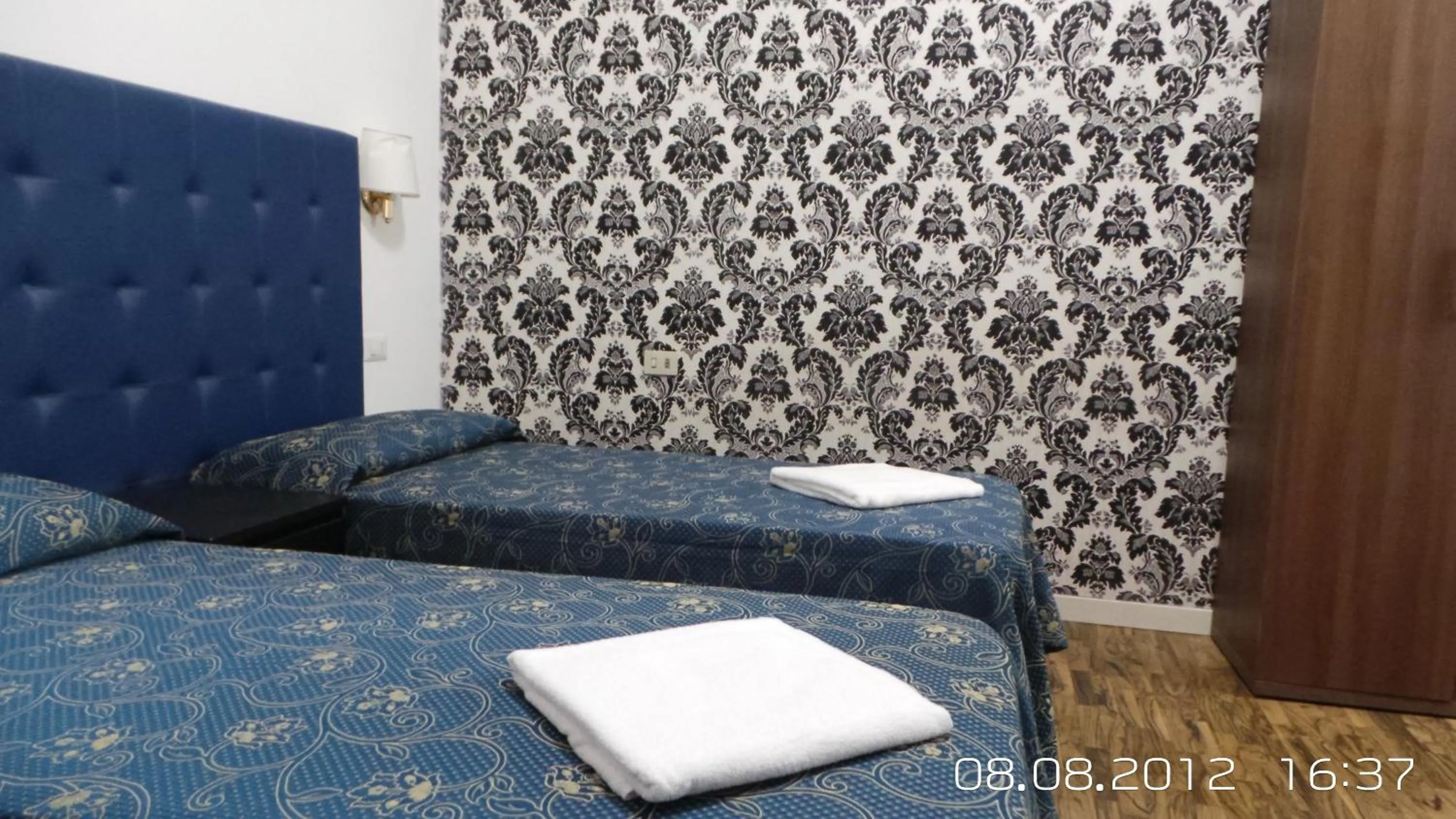 Photo of the whole room, Bed in Marziah Inn