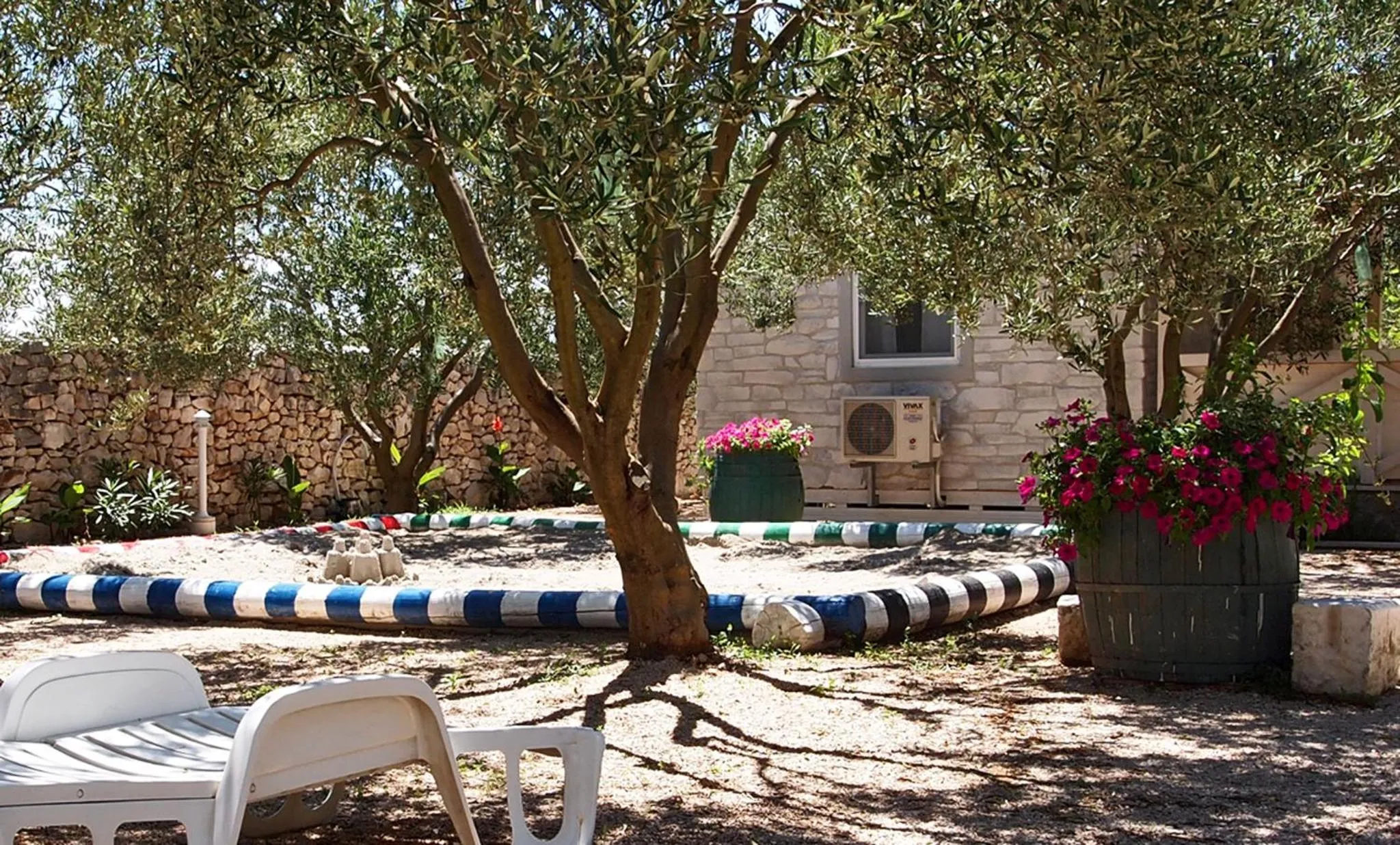 Children play ground in Mobile Homes Holiday Olive Garden