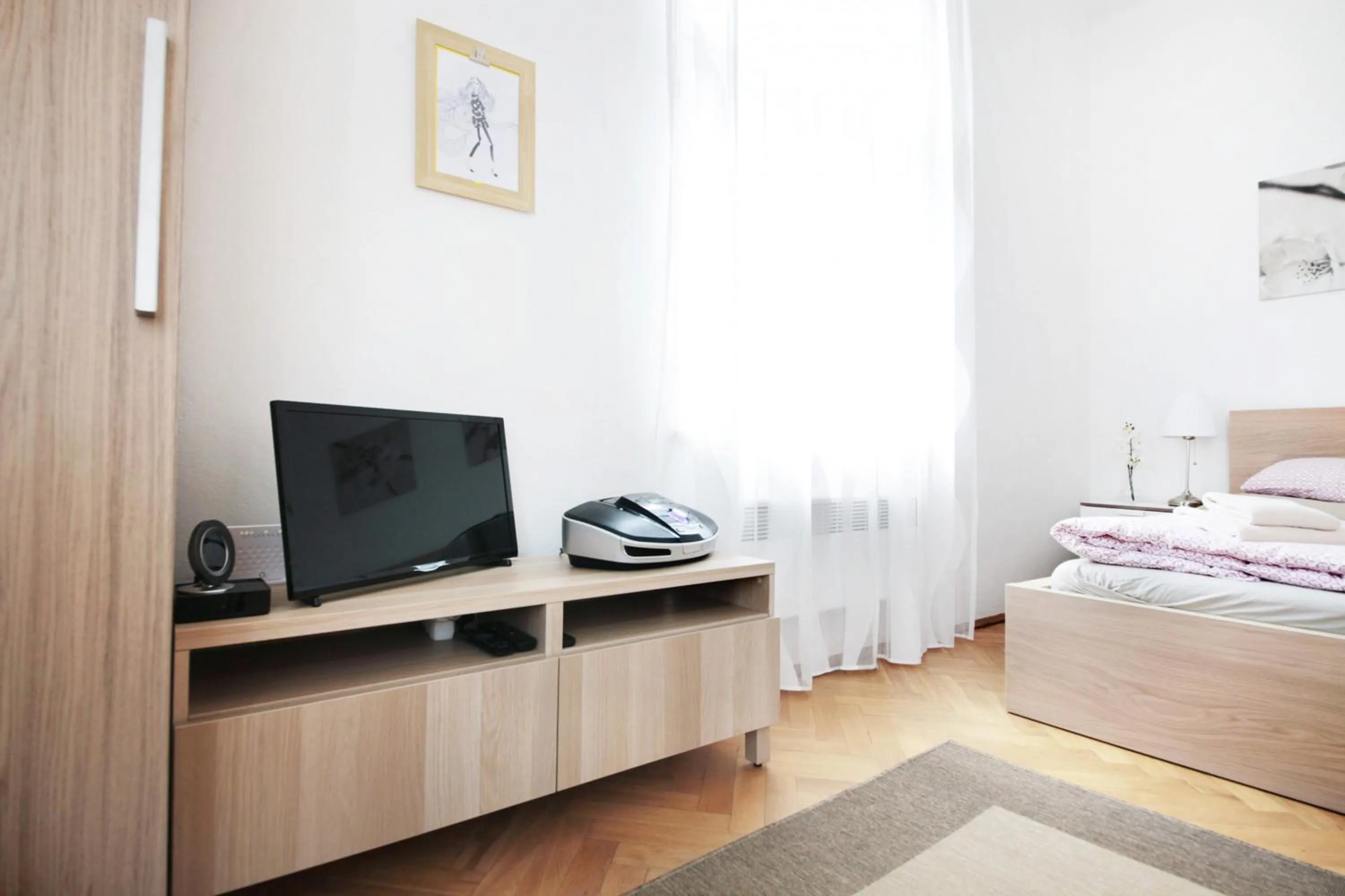 Bed in Angel City Aparthotel