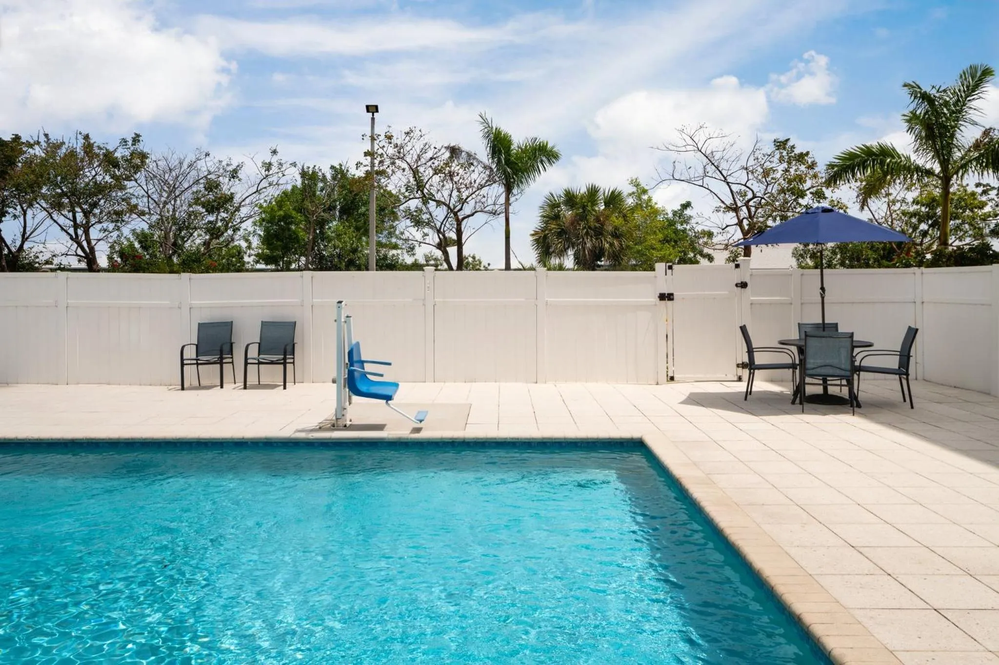 Swimming pool in Holiday Inn Express & Suites Boynton Beach by IHG
