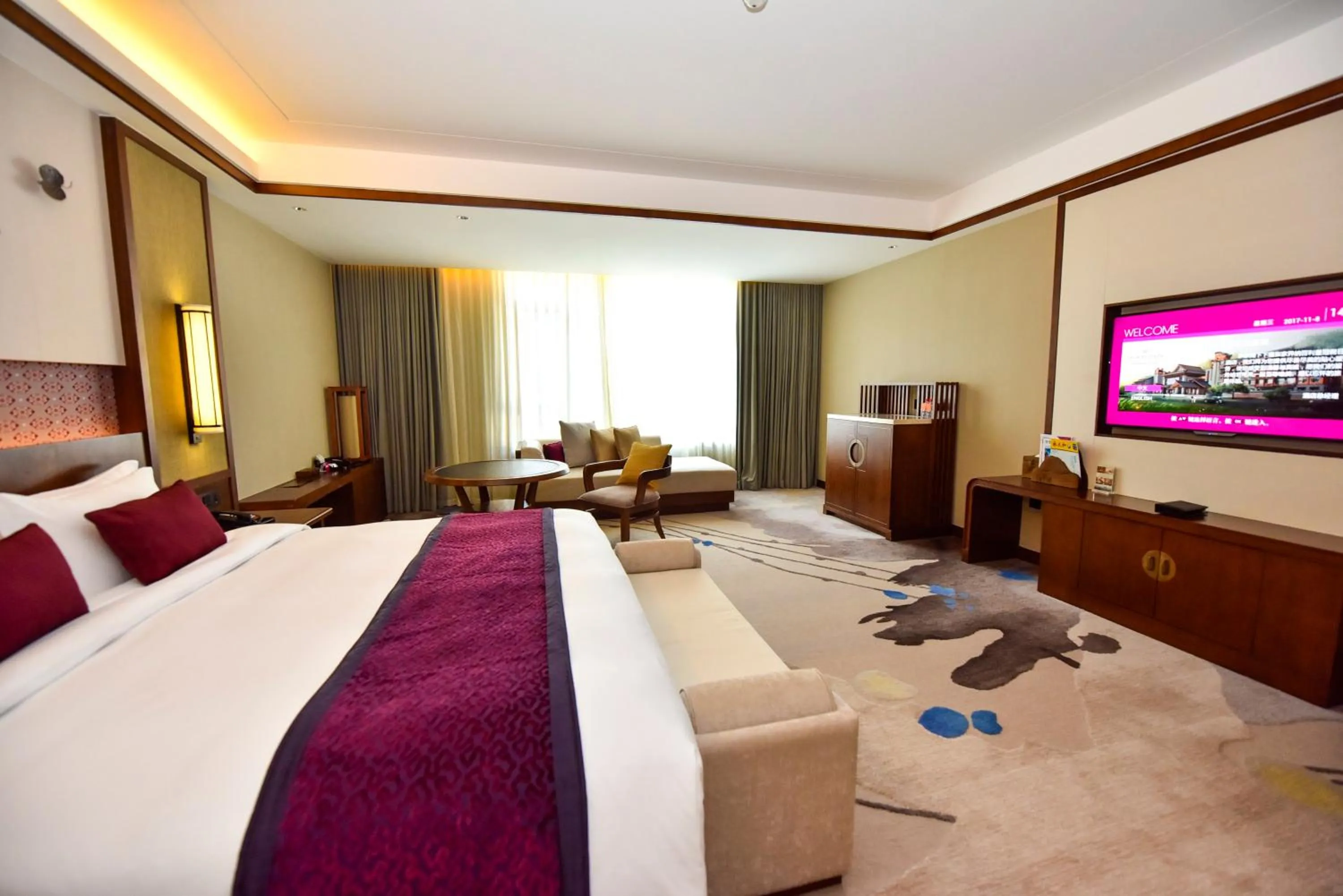 Photo of the whole room, Bed in Howard Johnson Neodalle Resort Zhangjiajie