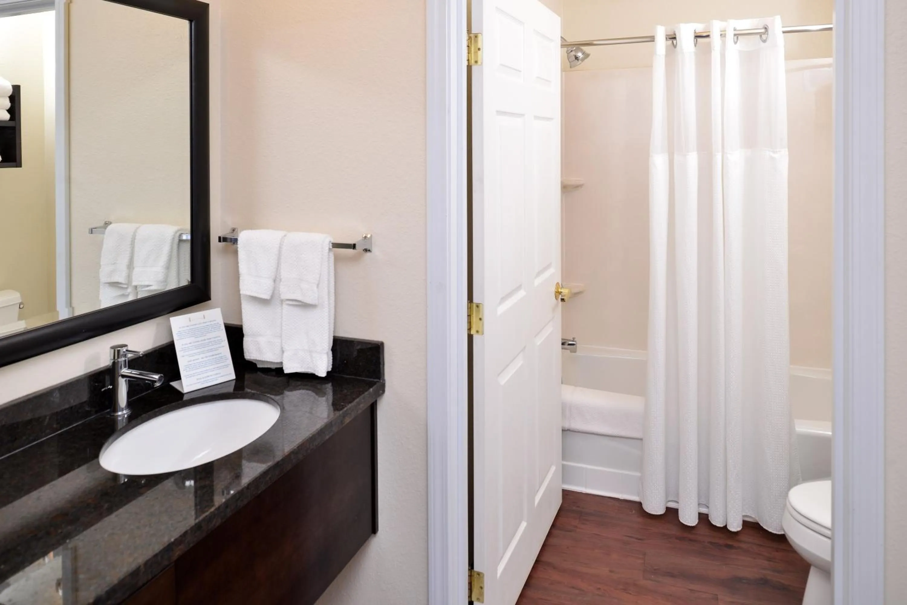 Bathroom in Staybridge Suites Sioux Falls at Empire Mall by IHG