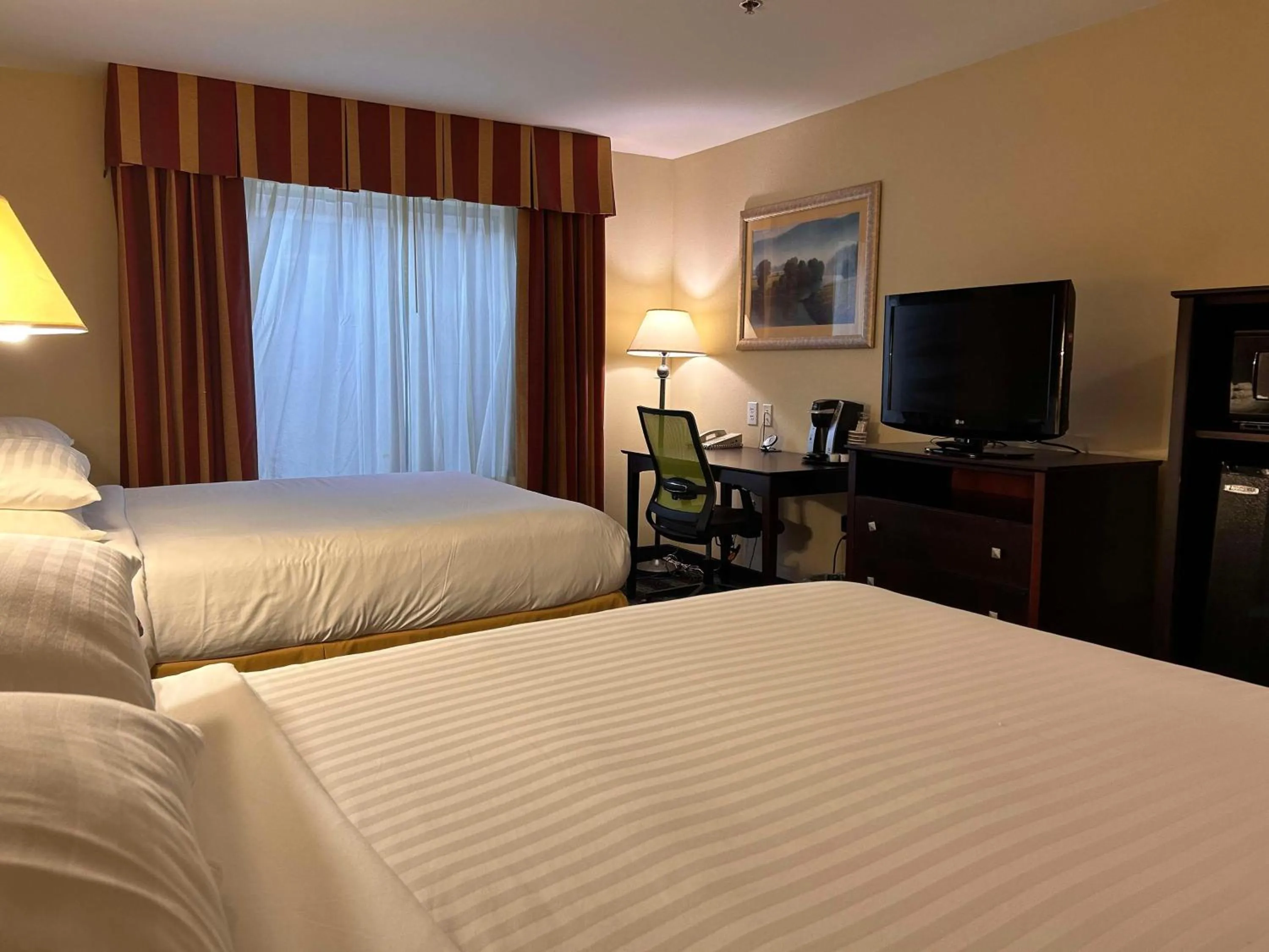 Bedroom, Bed in Express Inn Leesville Ft Johnson, SureStay Collection by Best Western