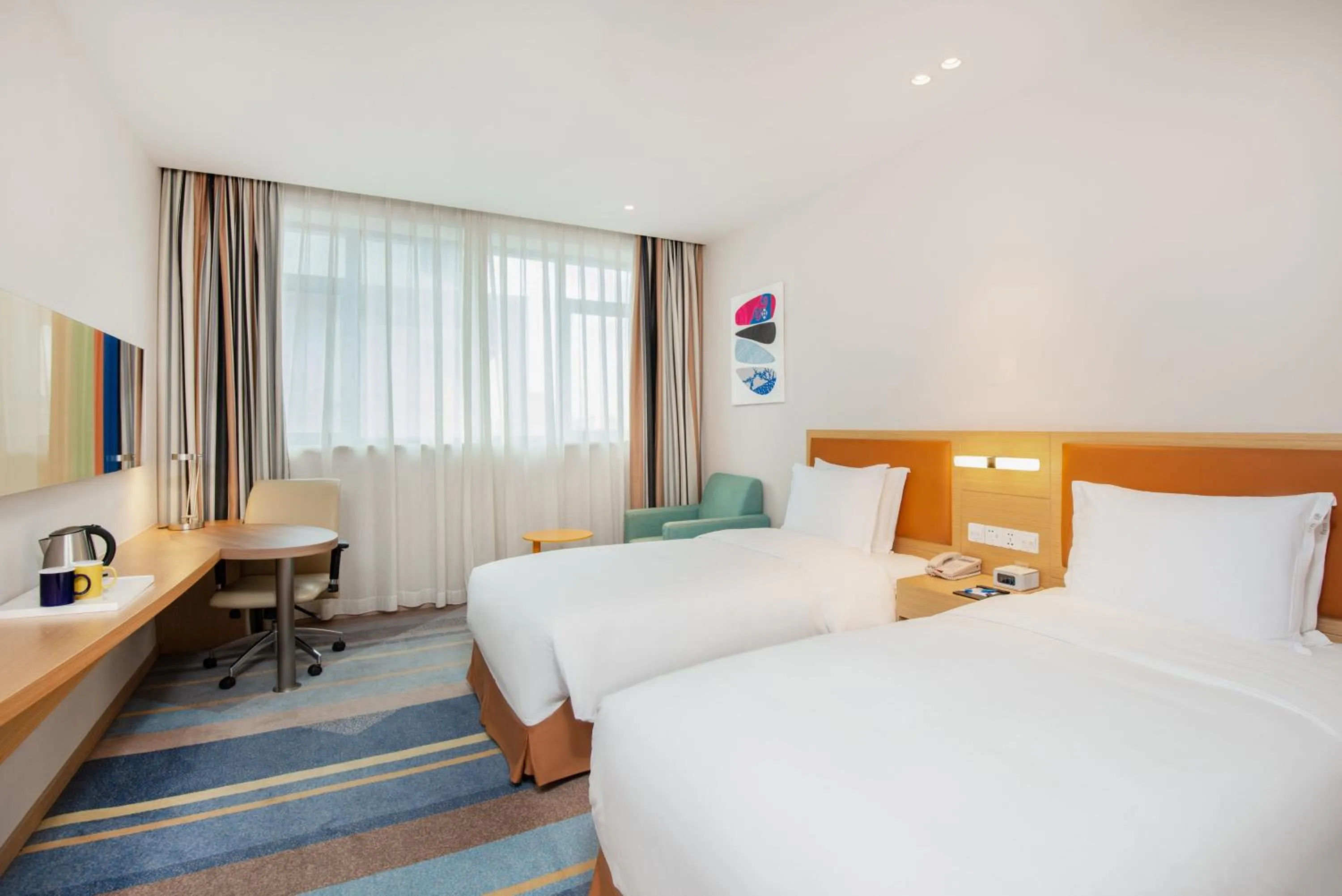 Photo of the whole room, Bed in Holiday Inn Express Shanghai Zhenping by IHG