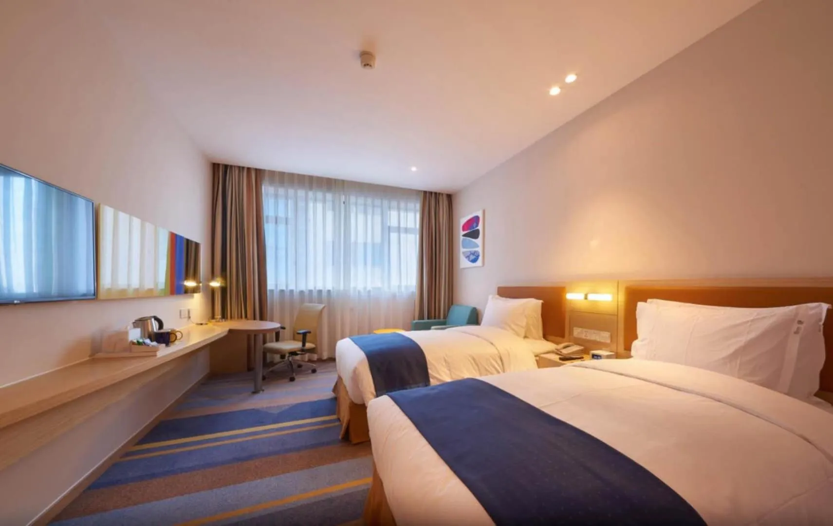 Bed in Holiday Inn Express Shanghai Zhenping by IHG