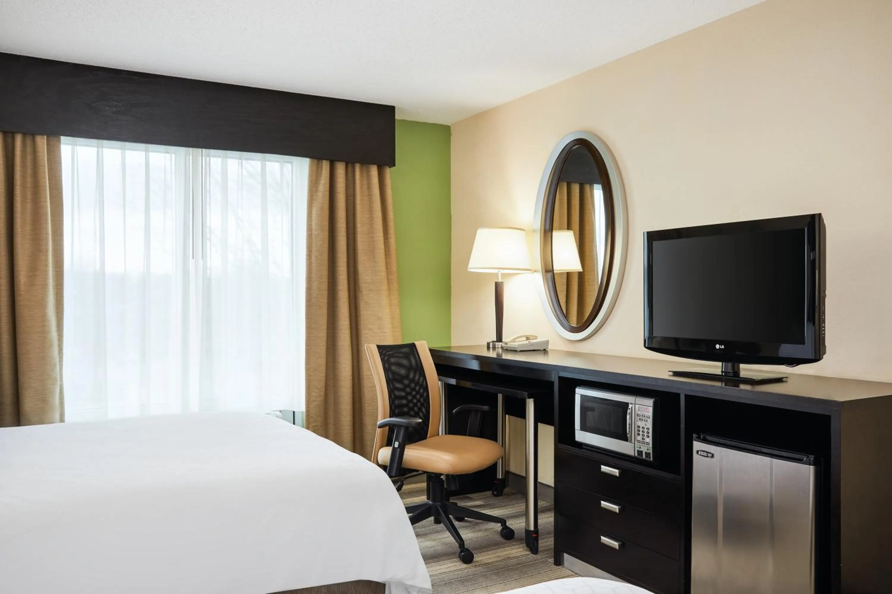 Bed in Holiday Inn Express & Suites I-26 & Us 29 At Westgate Mall by IHG