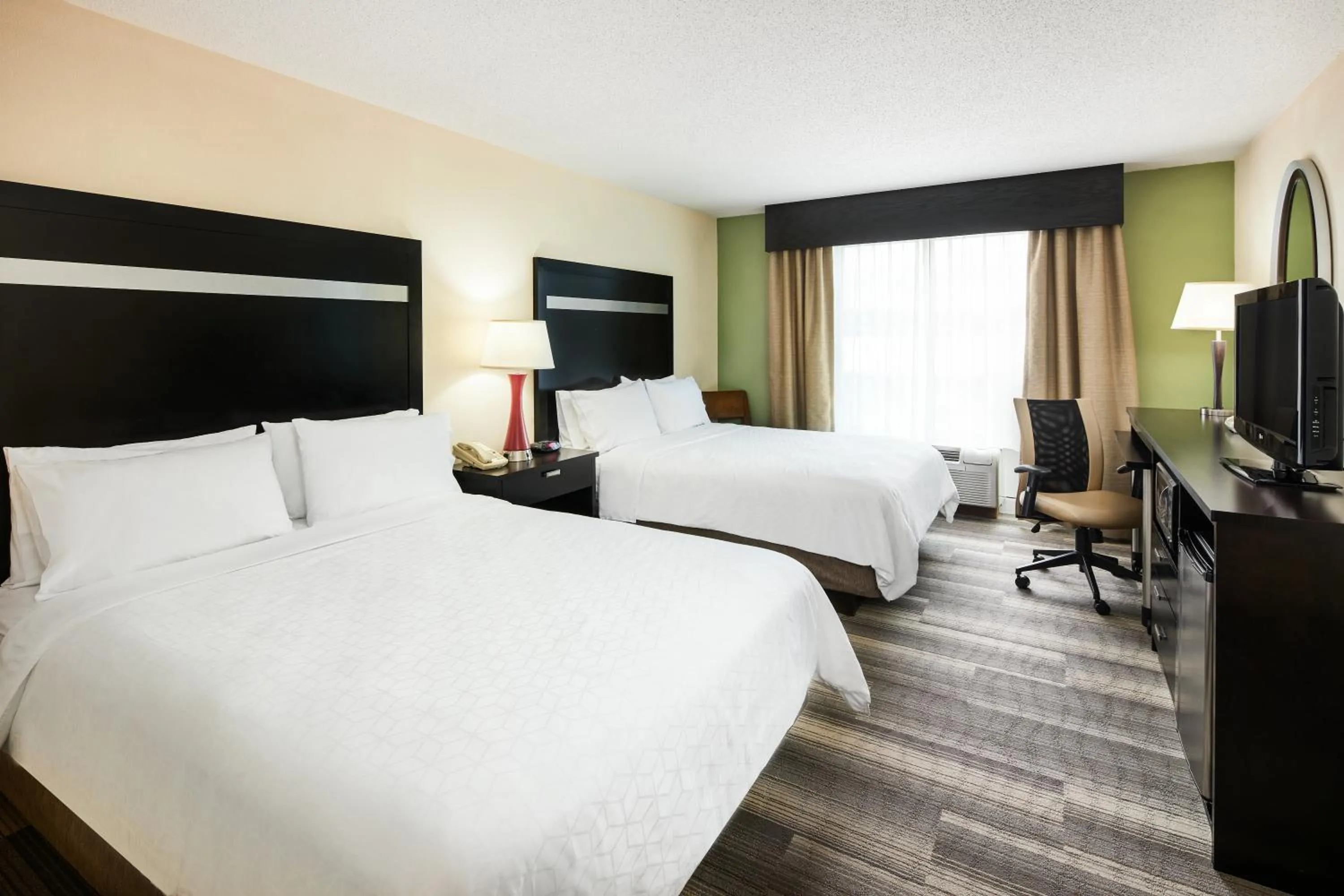 Bed in Holiday Inn Express & Suites I-26 & Us 29 At Westgate Mall by IHG
