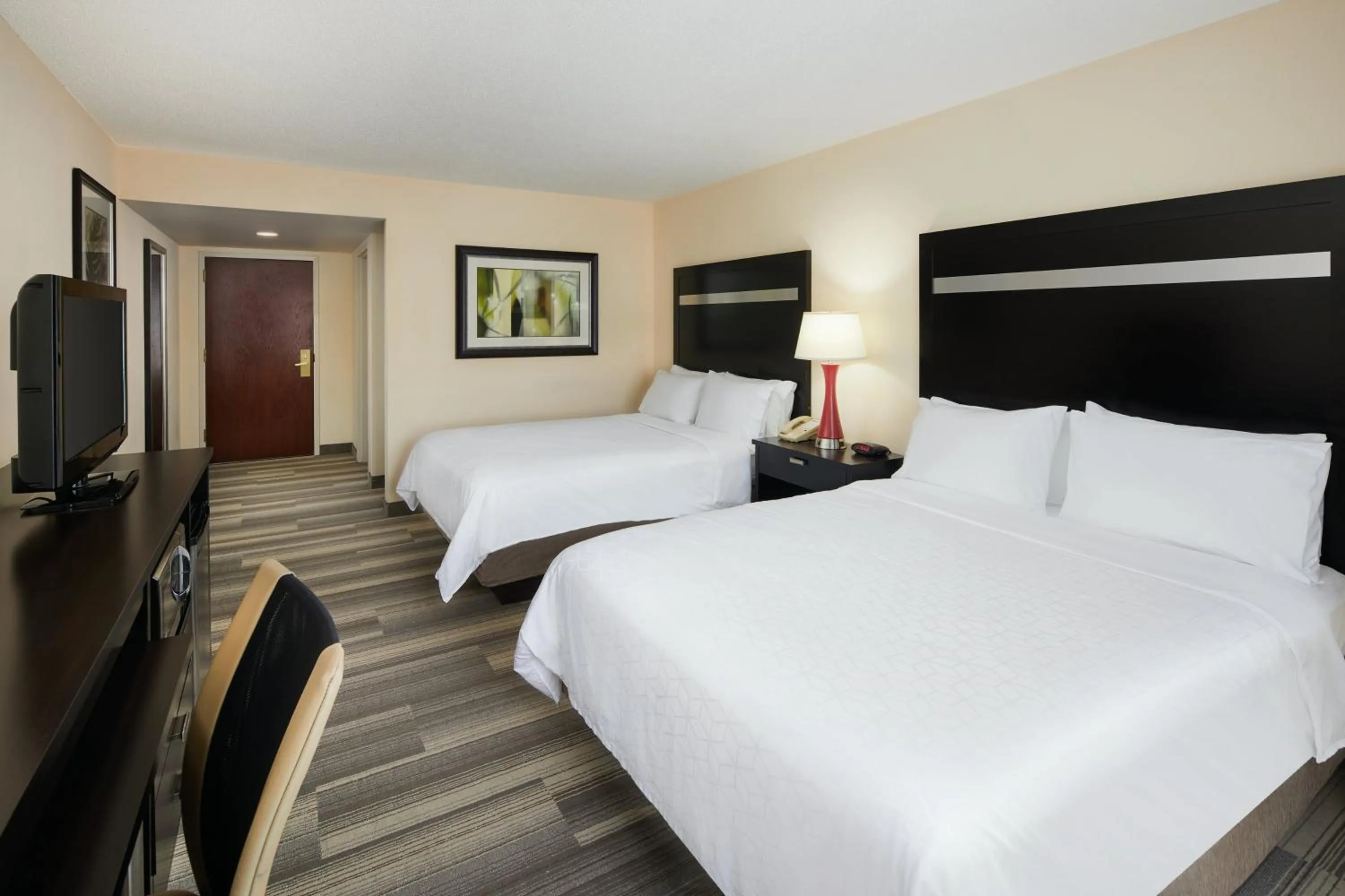 Photo of the whole room, Bed in Holiday Inn Express & Suites I-26 & Us 29 At Westgate Mall by IHG