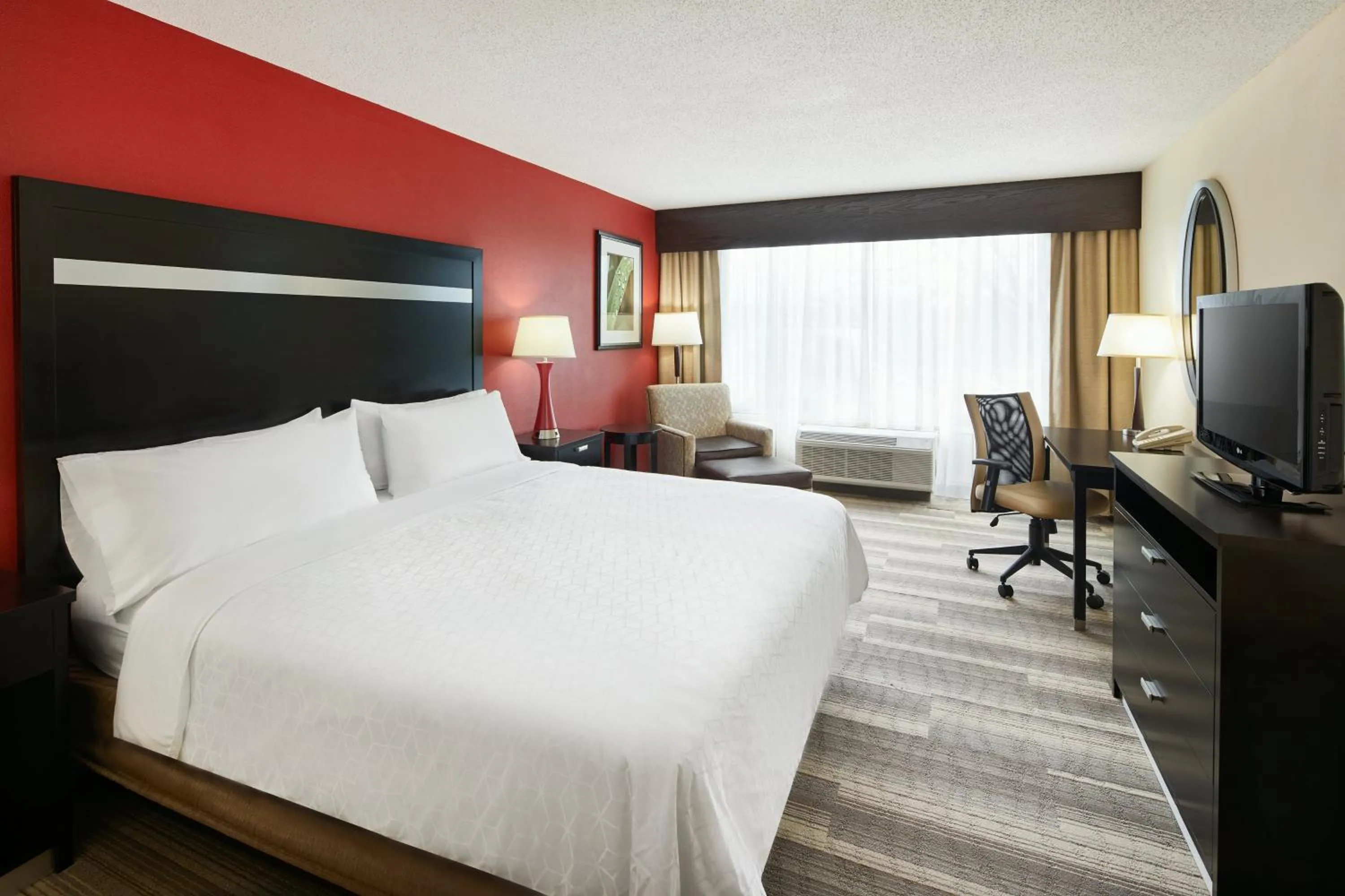 Photo of the whole room, Bed in Holiday Inn Express & Suites I-26 & Us 29 At Westgate Mall by IHG