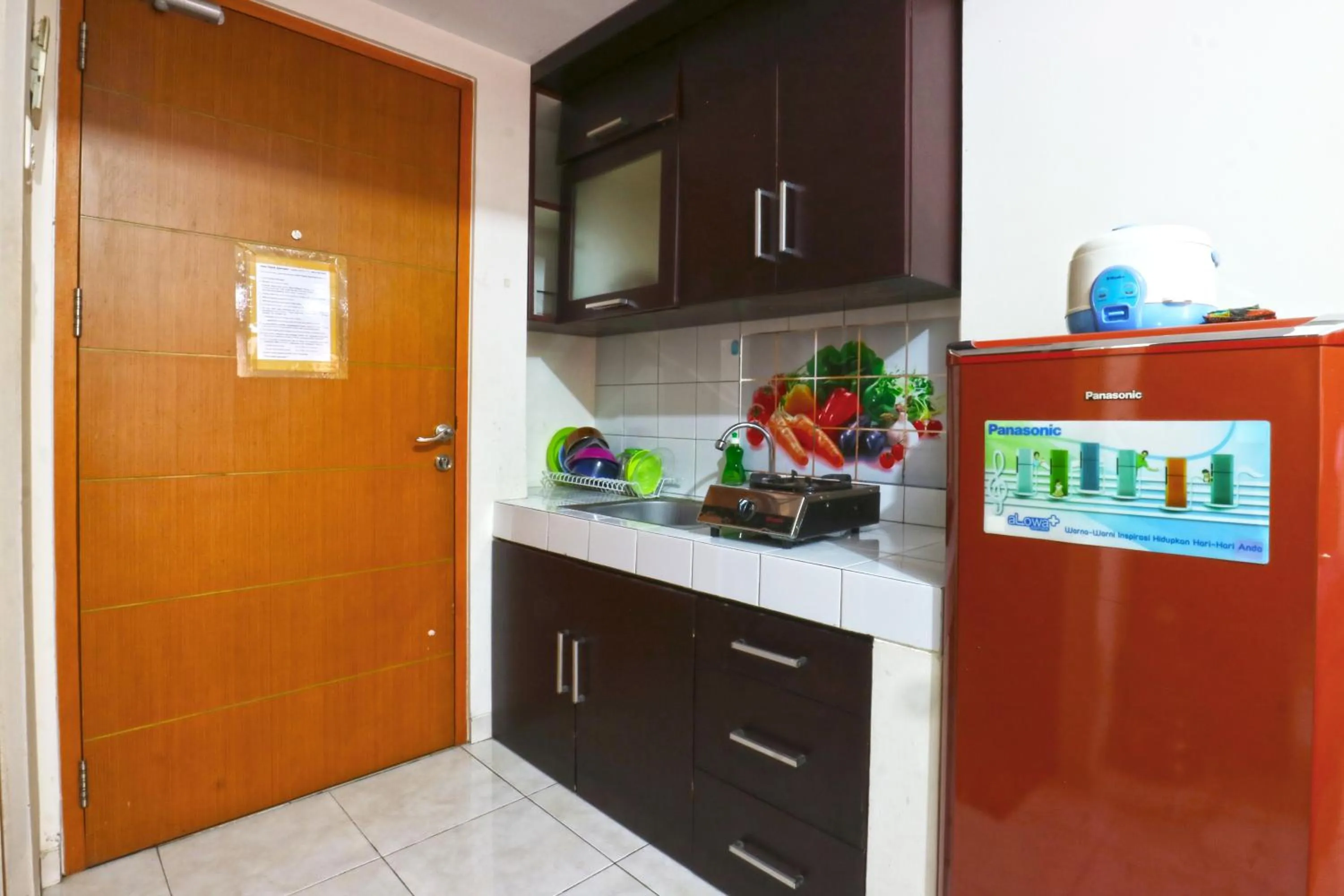 Kitchen or kitchenette in Dewi Depok Apartment Margonda Residence 2