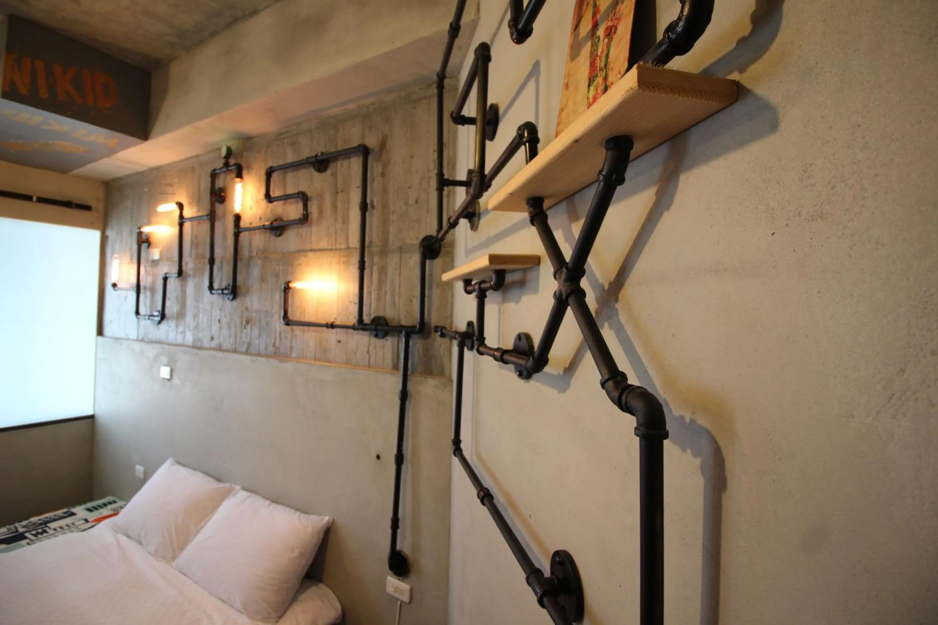 Decorative detail, Bed in Anping Wikid Design Hotel