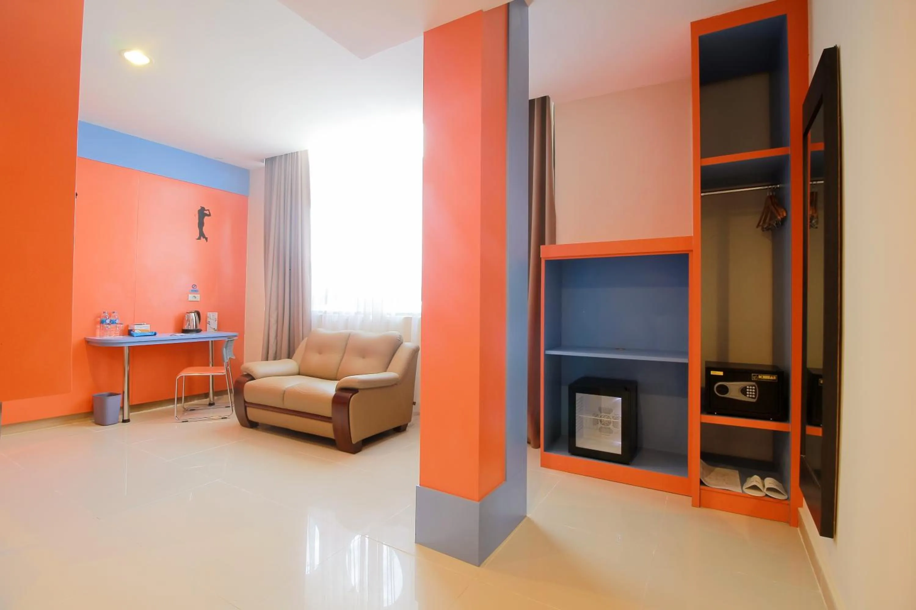 Seating area in Sinar Sport Hotel