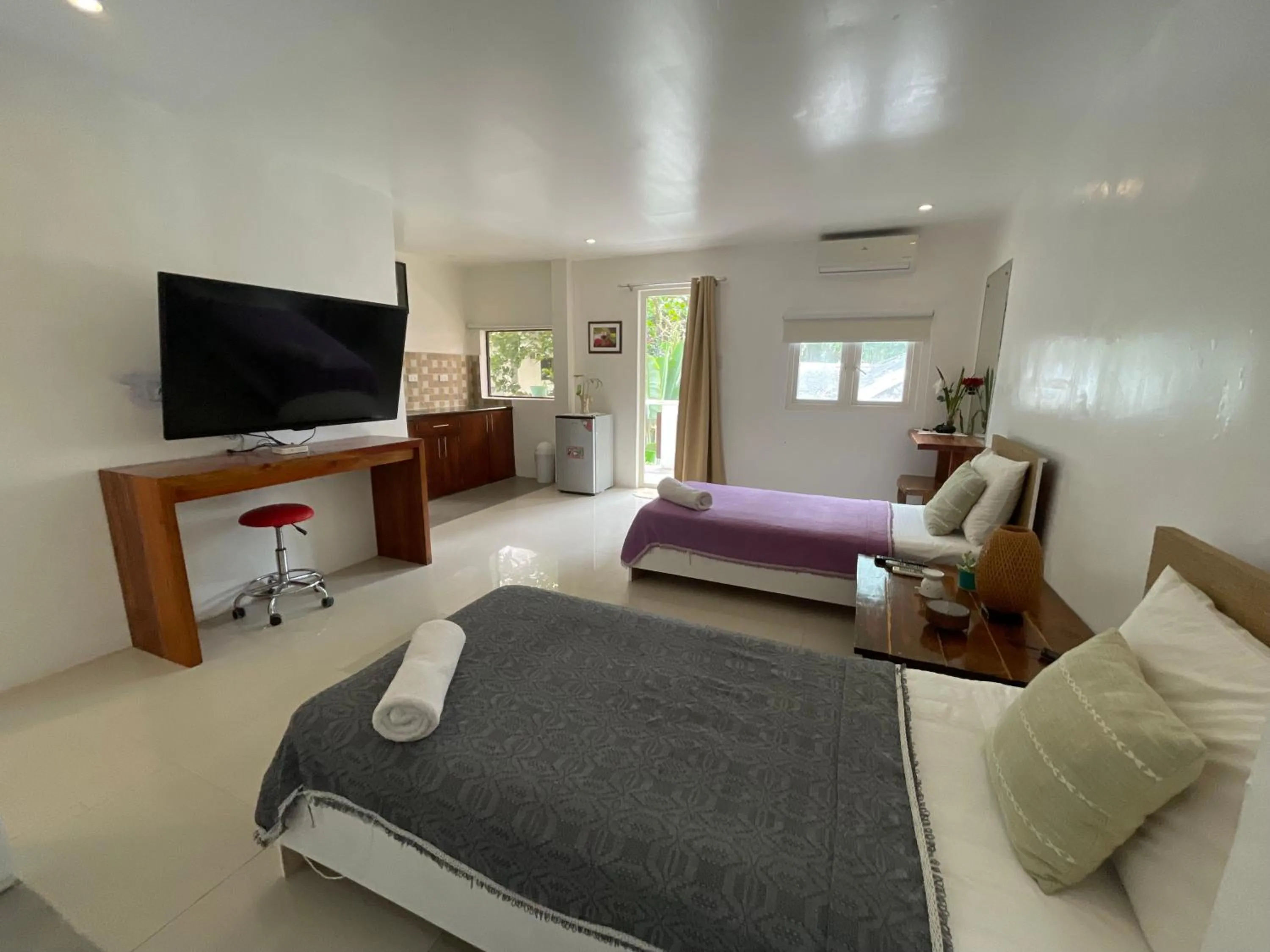 Bed in Everrich Boutique Resort Boracay