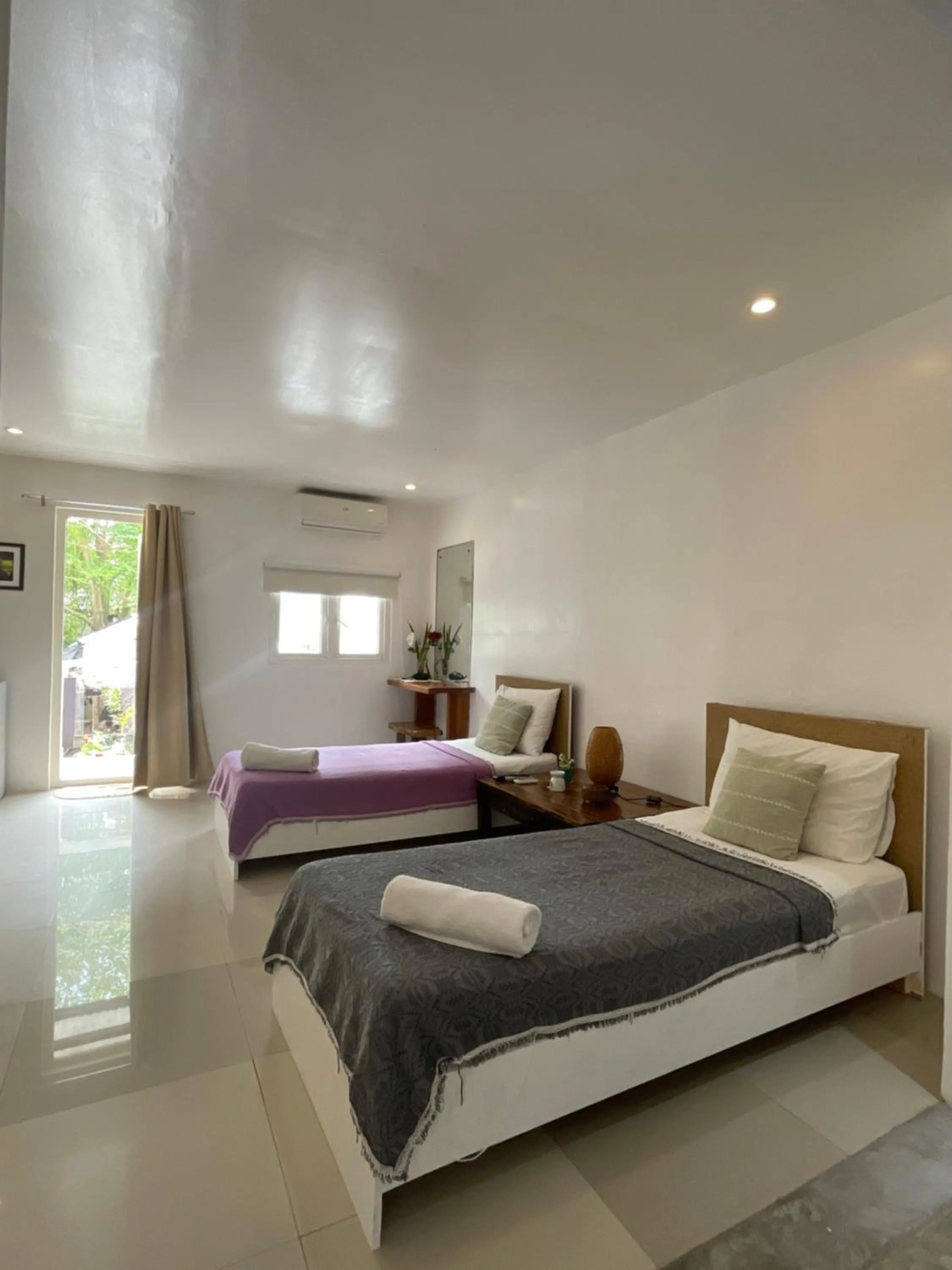 Bed in Everrich Boutique Resort Boracay