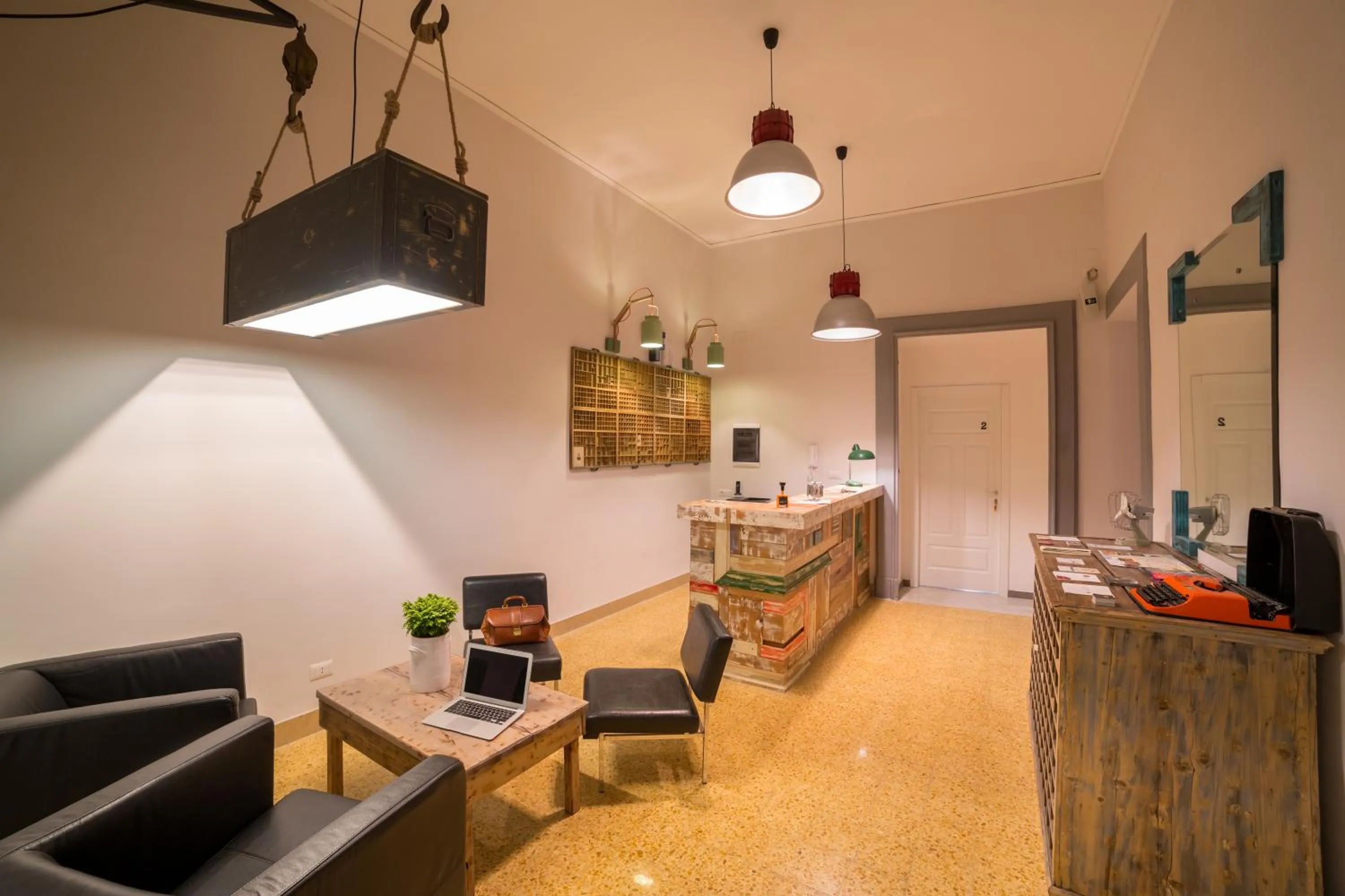 Communal lounge/ TV room in The Foria House by House In Naples