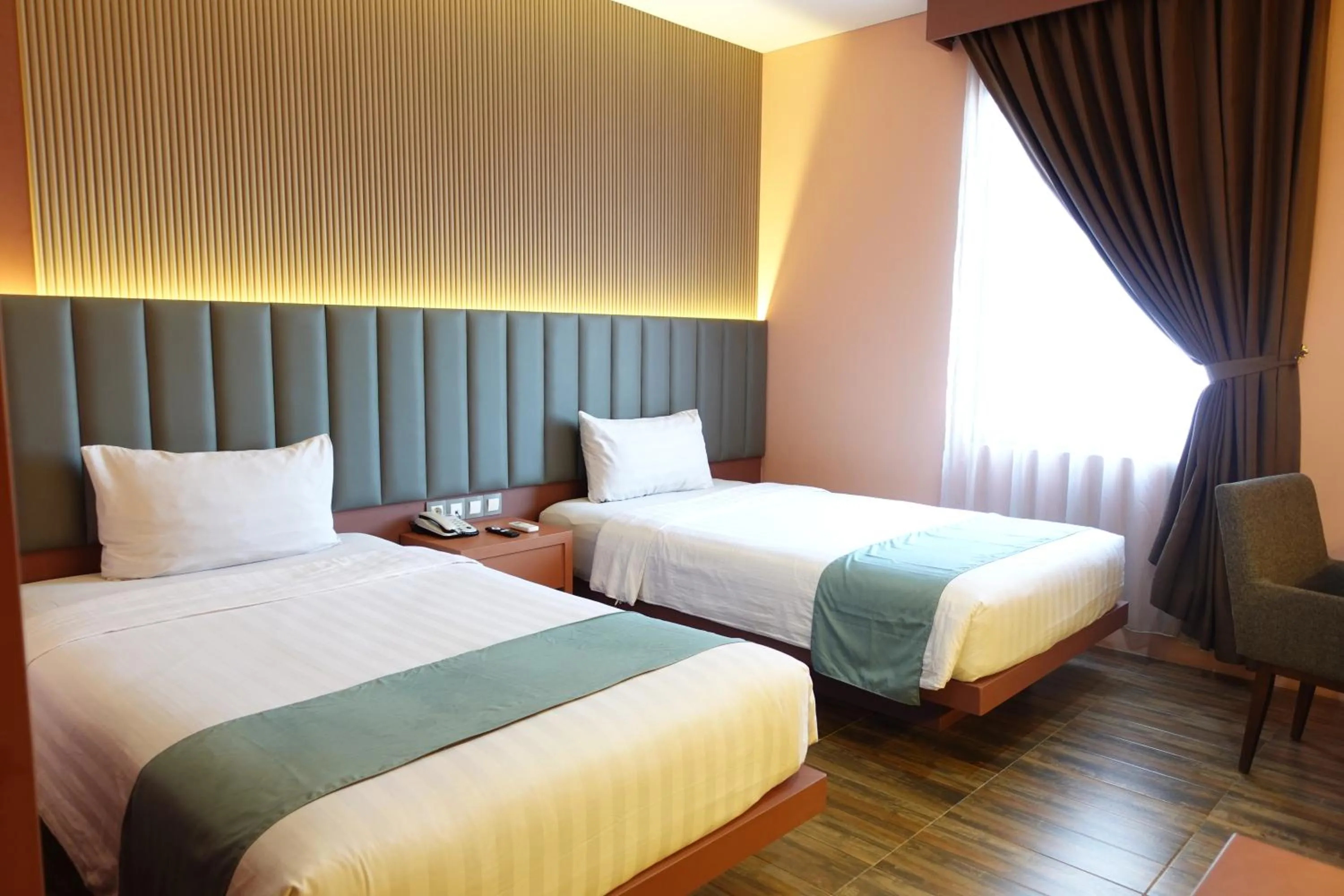 Bedroom, Bed in Grand Kangen Hotel Urip Sumoharjo