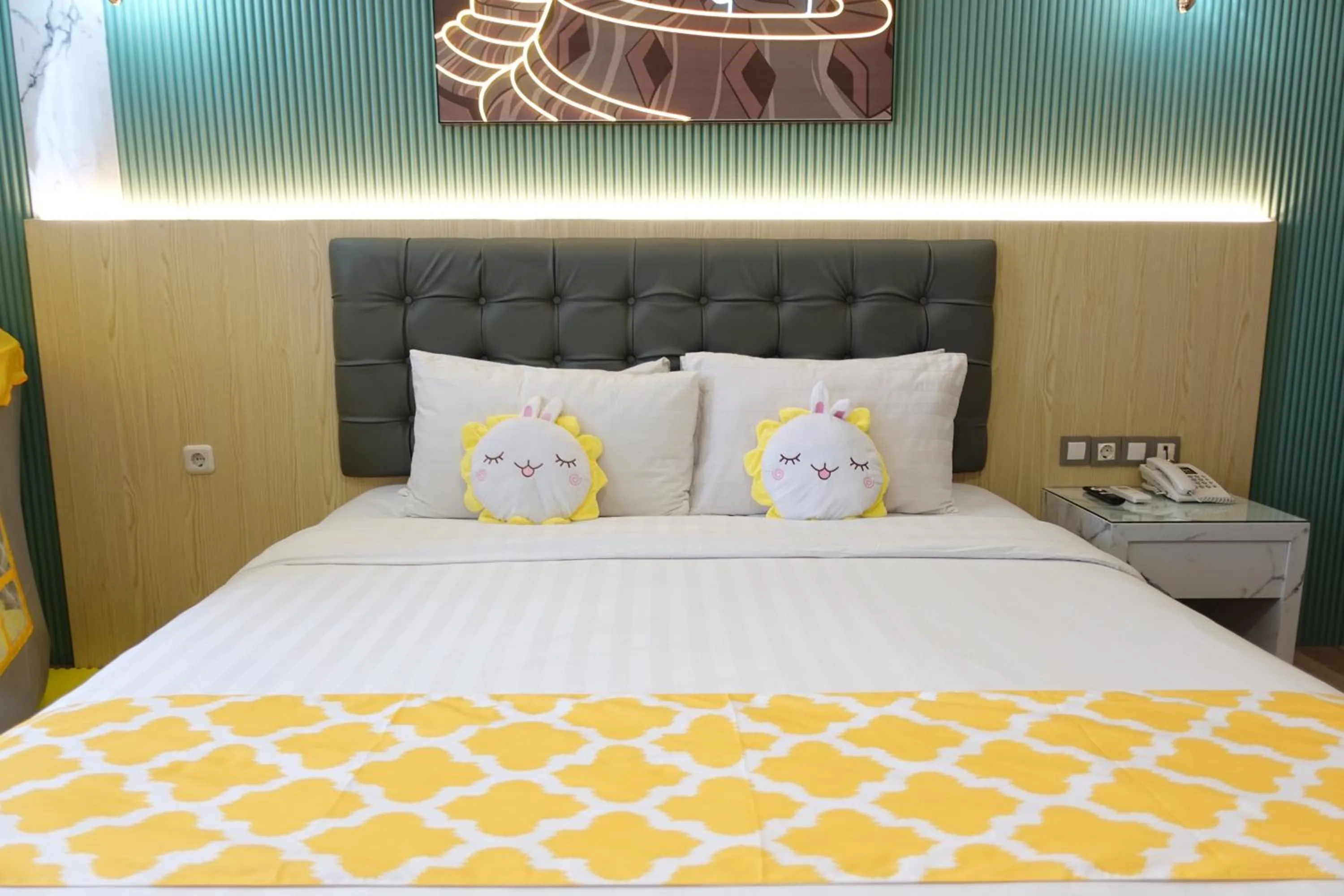 Bed in Grand Kangen Hotel Urip Sumoharjo