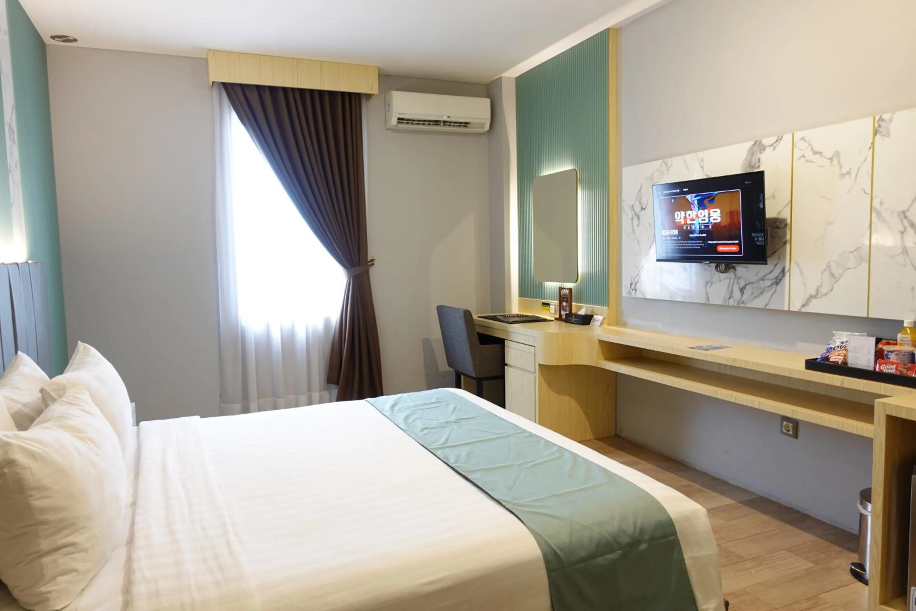 Bedroom, Bed in Grand Kangen Hotel Urip Sumoharjo