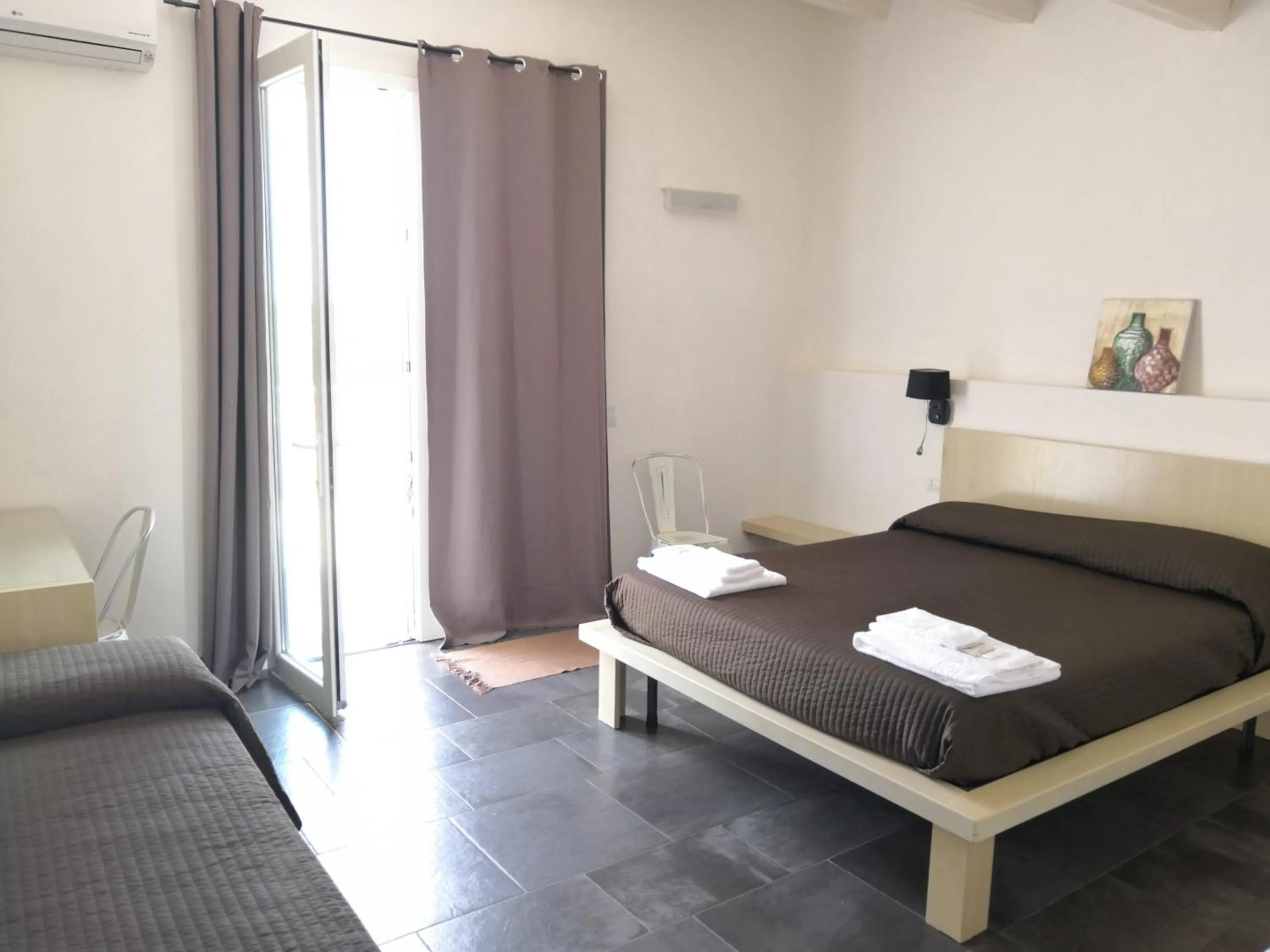 Triple Room with Terrace in La Mela Di Venere